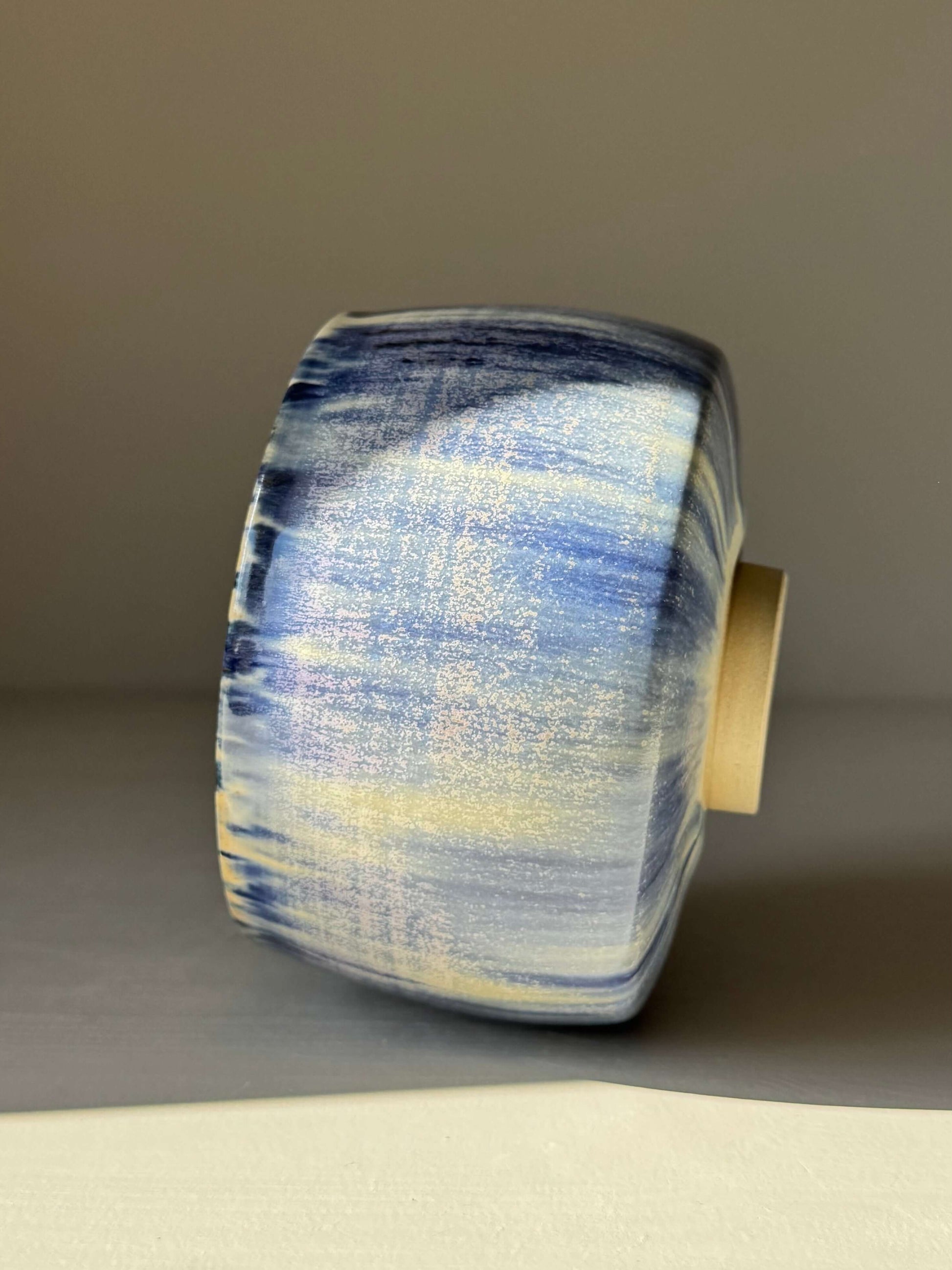 Side view of handcrafted Matcha bowl - Cobalt Blue & Moonstone Glaze #02, showcasing deep cobalt blue beneath silky moonstone glaze.