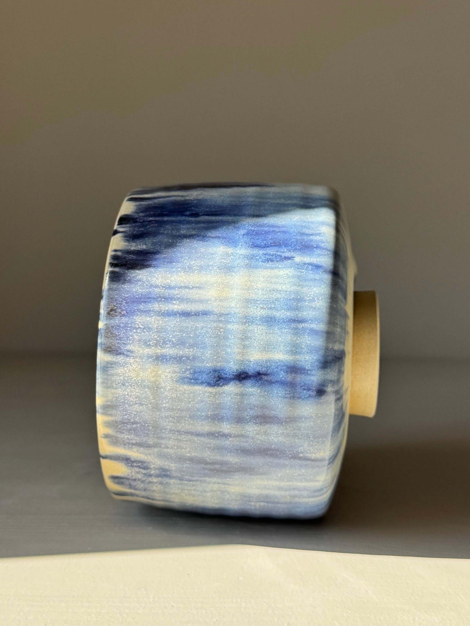Handmade ceramic Matcha bowl - Cobalt Blue & Moonstone Glaze #01 featuring layered cobalt and moonstone glazes, side view.