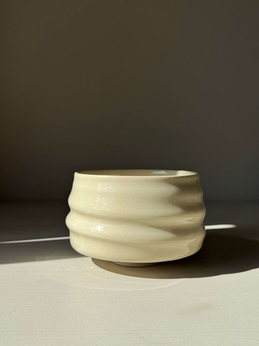 Handmade ceramic Matcha Bowl - Clear Glaze #01 with natural ridges and wide foot, highlighting soft simplicity and gentle warmth.