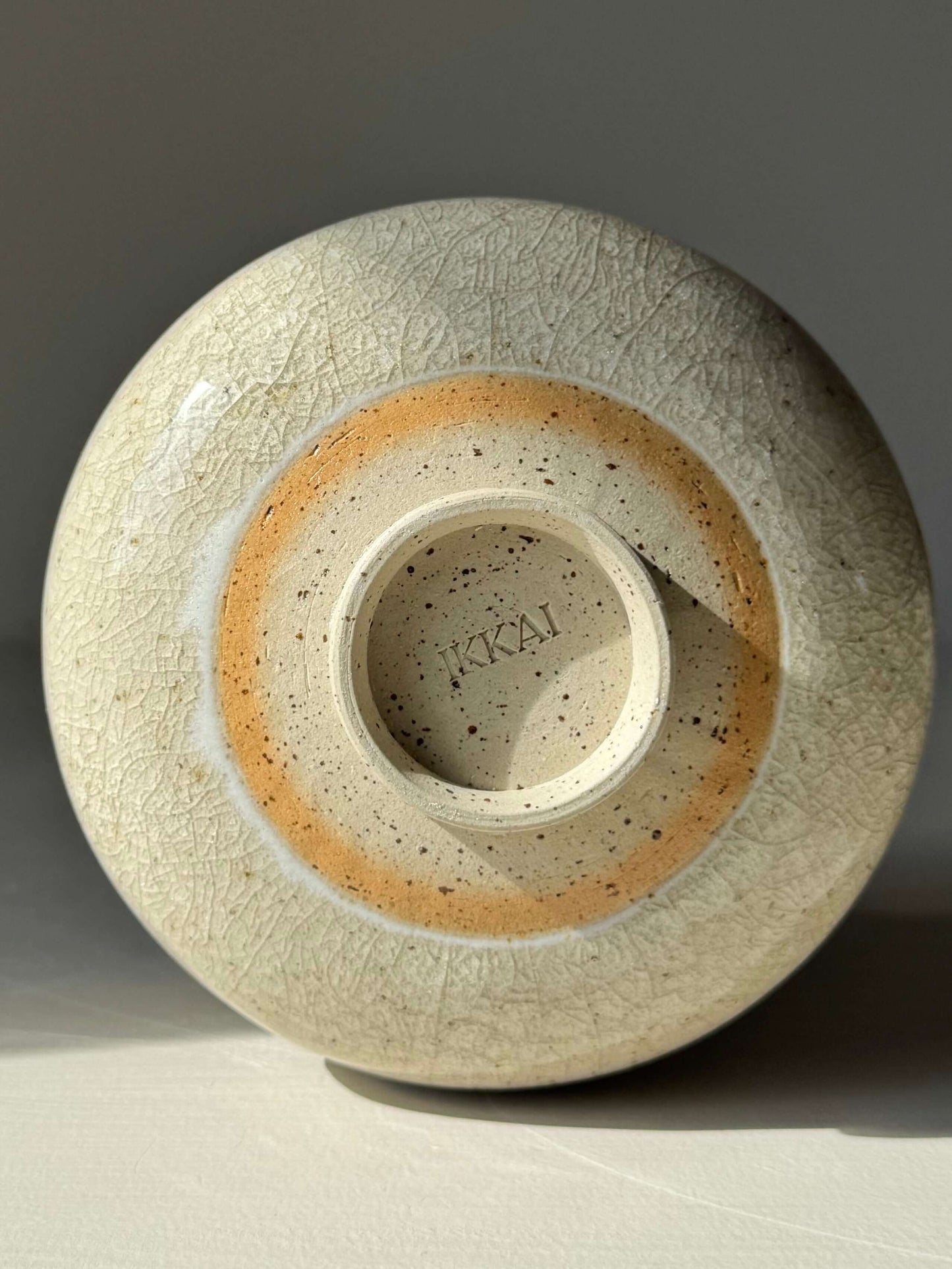 Matcha Bowl - Kannyū #01, handmade ceramic with crackle glaze, showcasing unique texture and craftsmanship on the base.