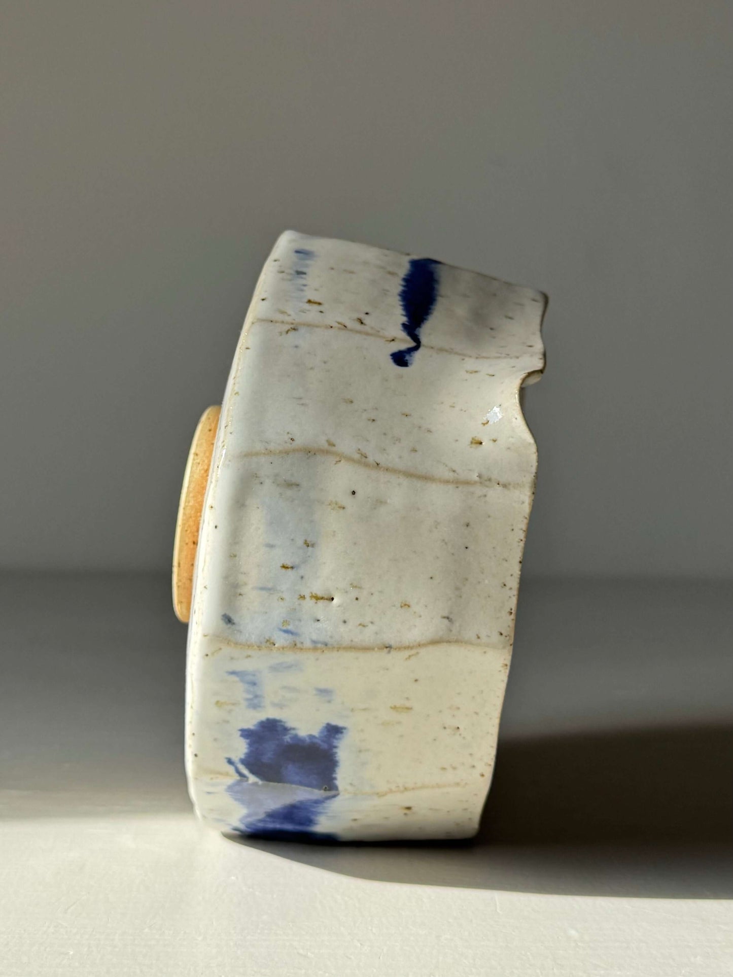 Faceted Matcha Bowl with Spout – Cobalt Blue & Glossy White Glaze #010, handmade ceramic, side view highlighting texture and spout