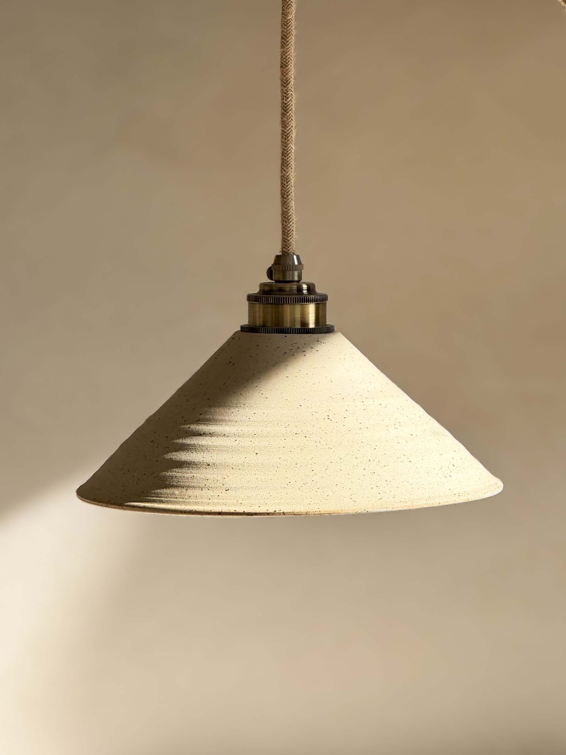 Handmade Ceramic Lamp Shade – Half Glossy White Glaze with raw texture and glossy interior for a warm, soft light effect.
