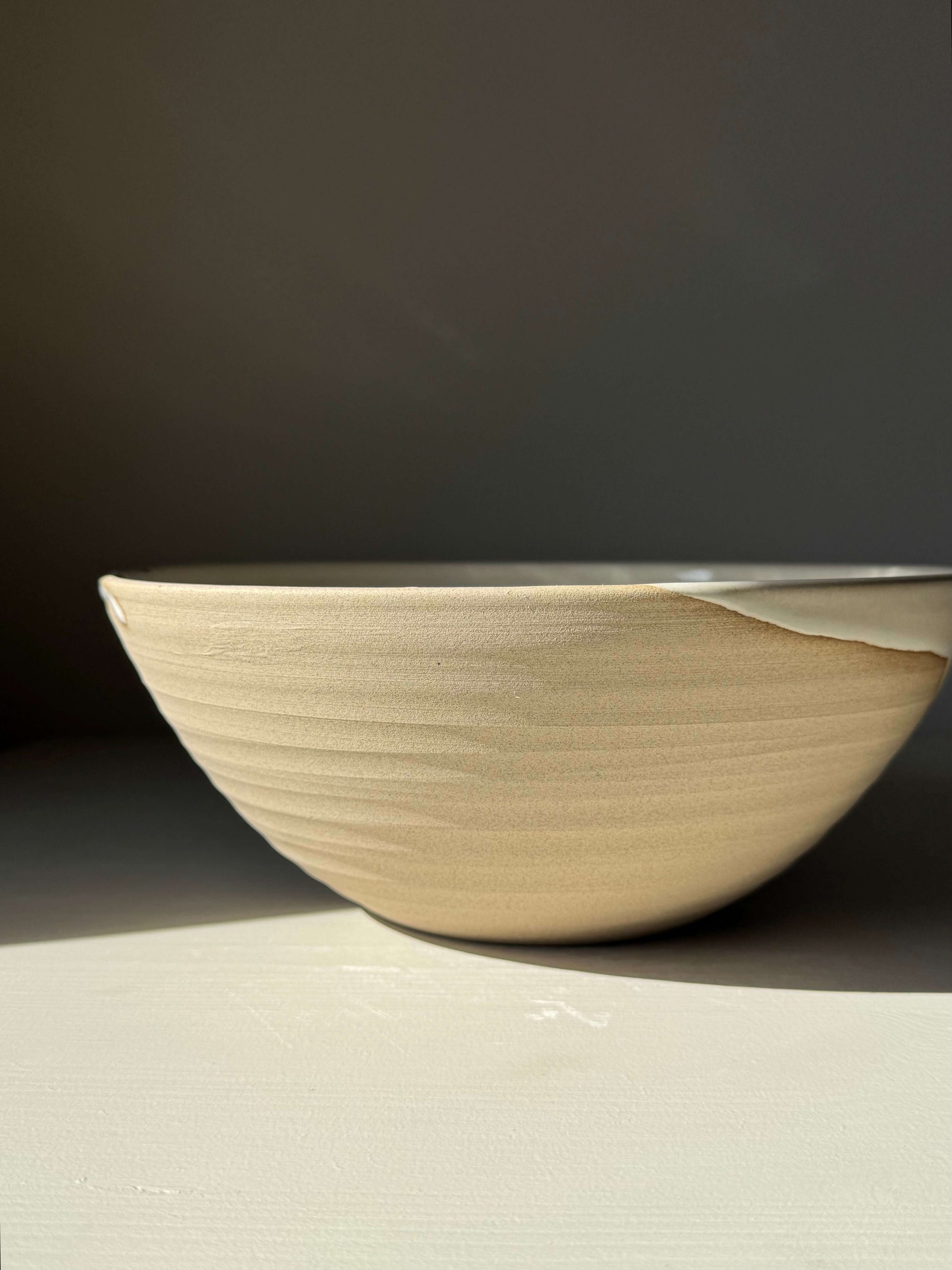 Medium Bowl - Yuki Series #02 handmade ceramic with glossy white glaze and warm toffee-colored clay exterior.