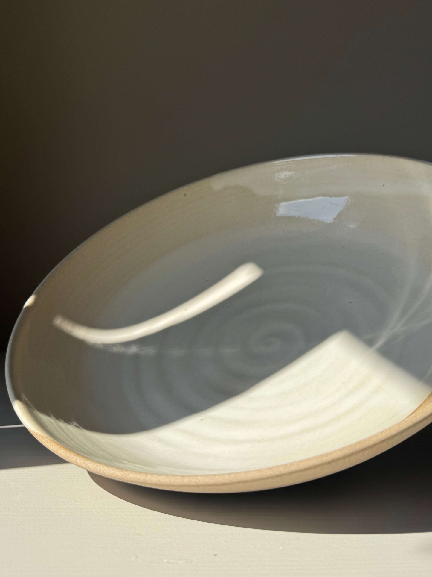 Handmade ceramic Large Shallow Bowl - Yuki Series with white glaze and sculptural design, perfect for shared meals and salads.