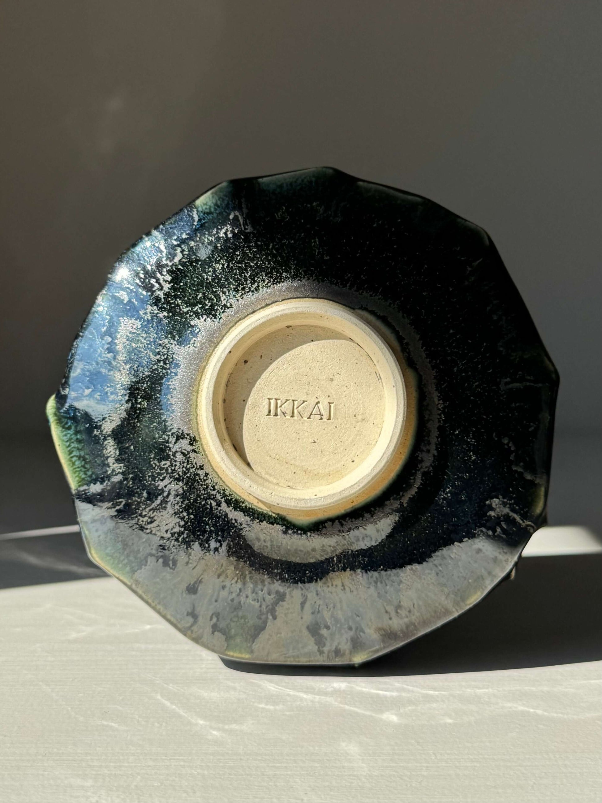 Base view of handmade ceramic Textured Matcha Bowl - Hinoki Series #03, showcasing unique glaze finish and craftsmanship.