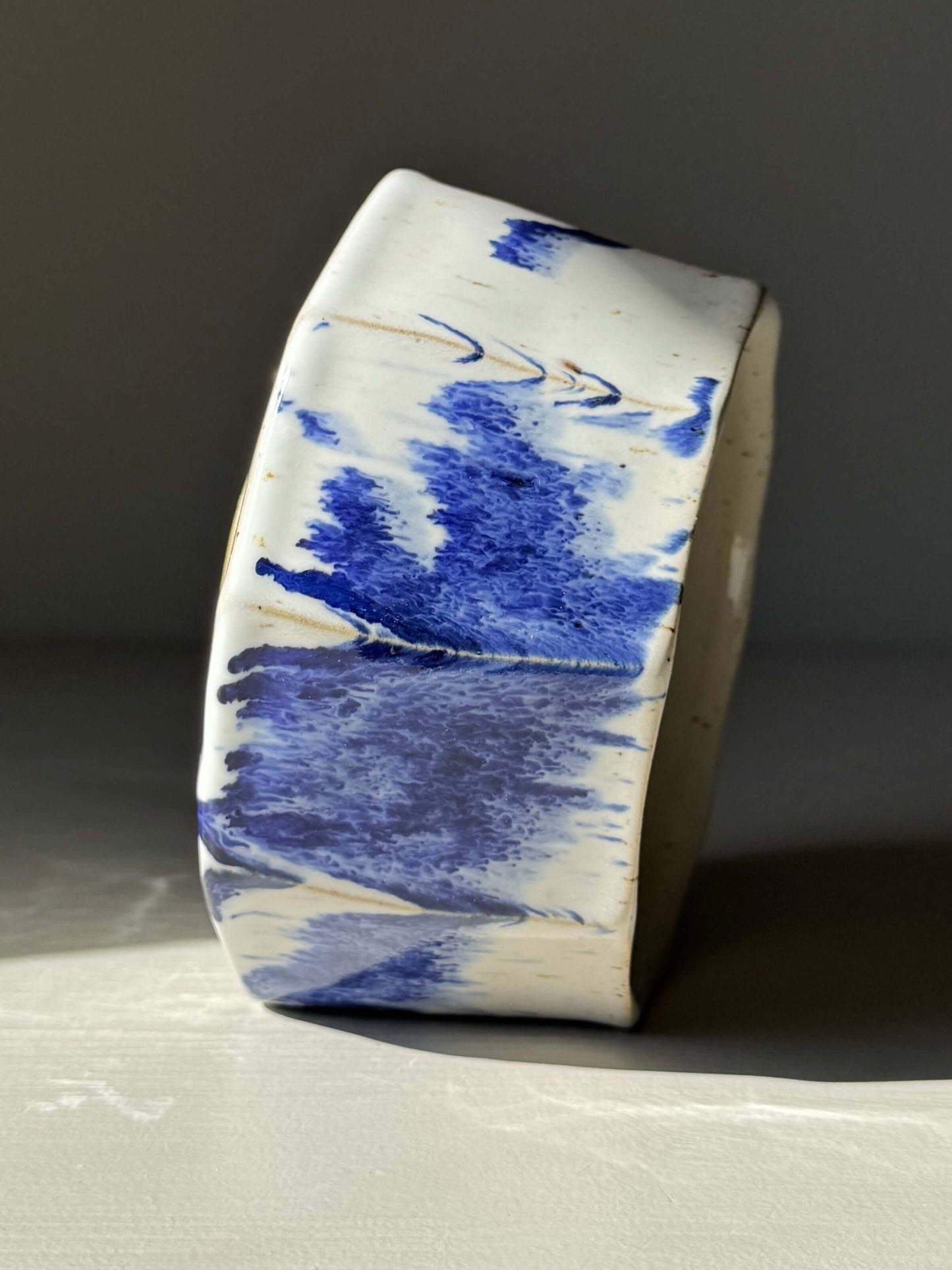 Faceted Matcha Bowl – Cobalt Blue & Glossy White Glaze #03, showcasing unique handmade ceramic design with cobalt blue splashes.