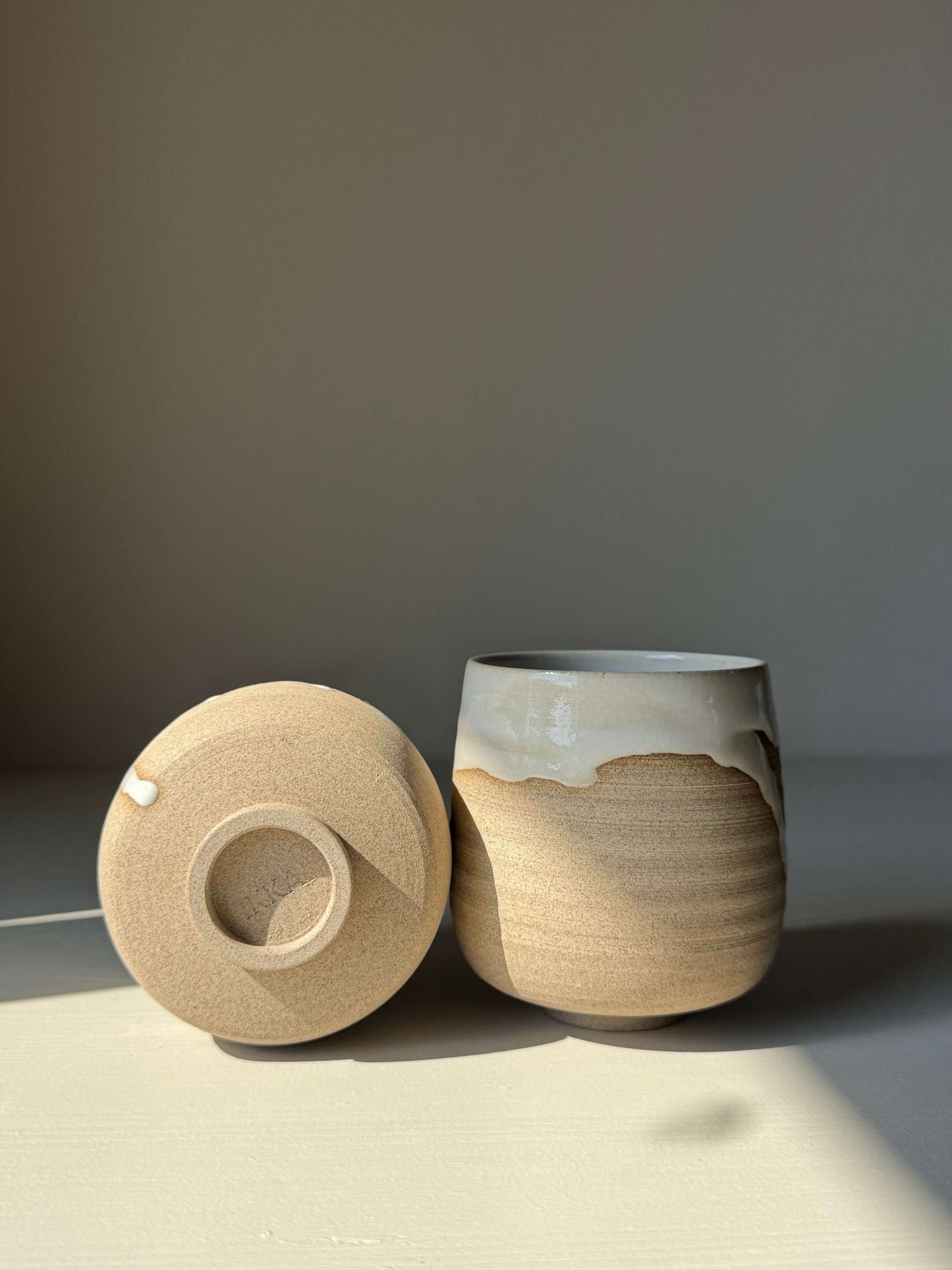 Yunomi Cups - Yuki Series handmade ceramic with white glaze on toffee clay, showing unique drips and a glossy finish.