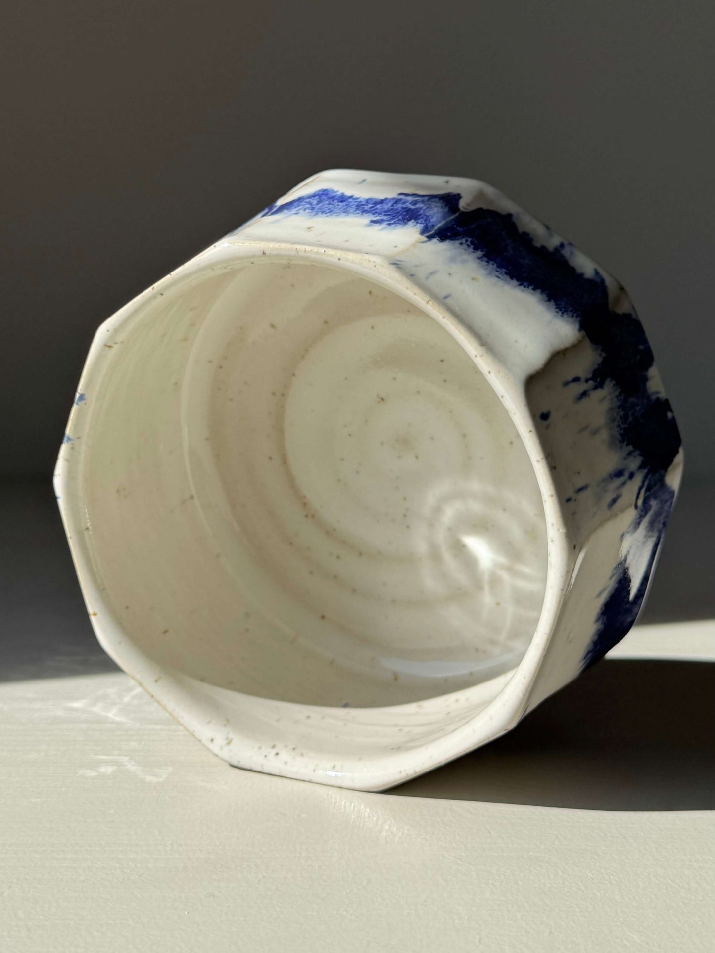 Faceted Matcha Bowl – Cobalt Blue & Glossy White Glaze #03, handmade ceramic with unique design and cobalt blue splashes.