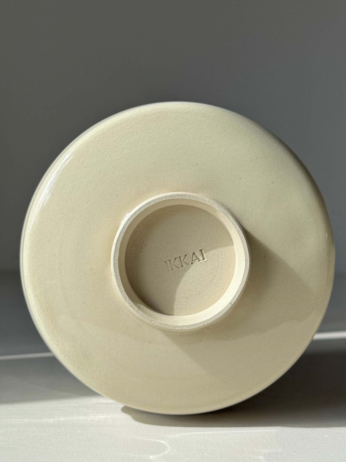 Bottom view of Matcha Bowl - Clear Glaze #01 showing the wide trimmed foot. Handmade ceramic design with natural stoneware simplicity.