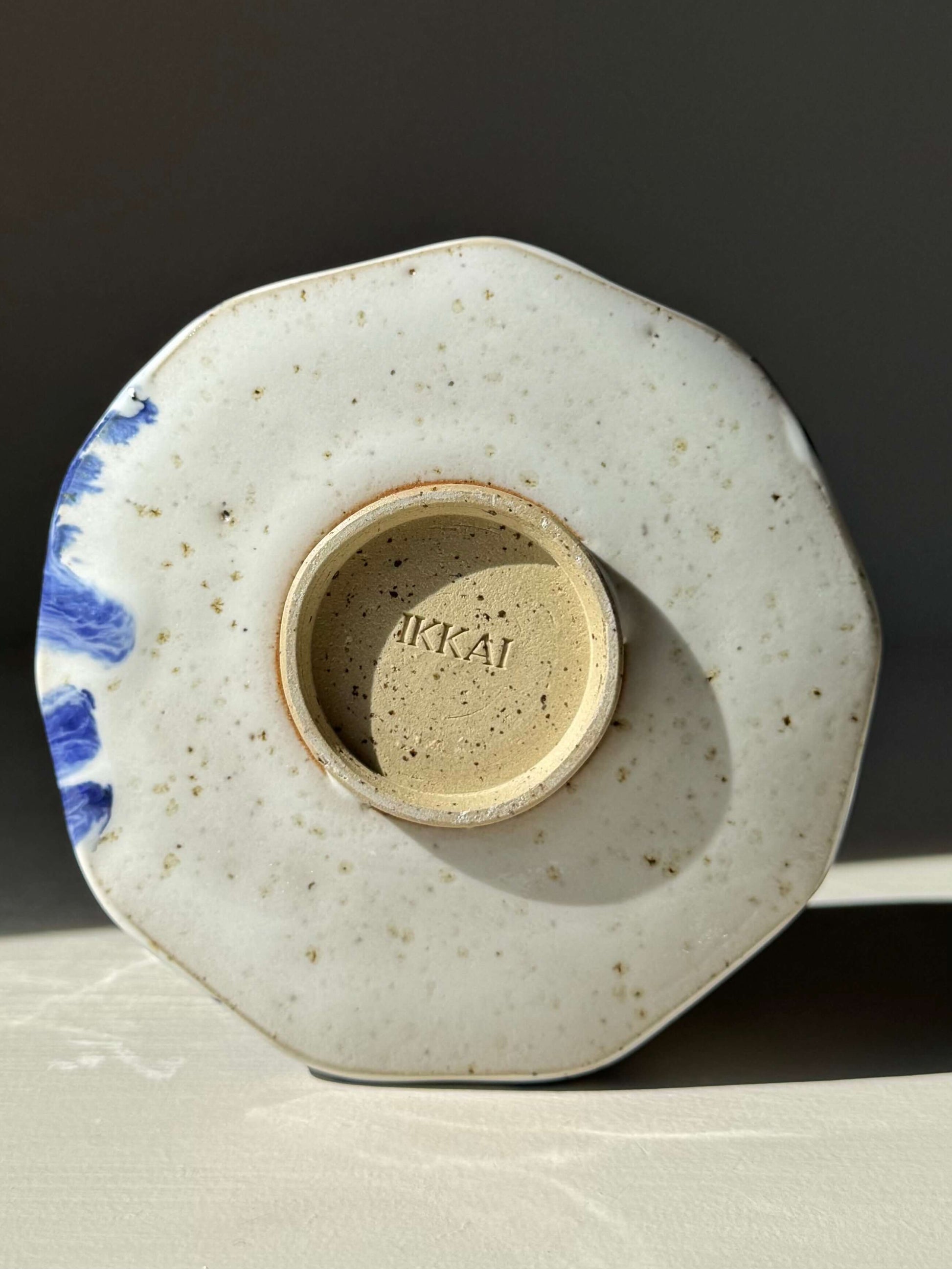 Faceted Matcha Bowl with Spout – Cobalt Blue & Glossy White Glaze #01, handmade ceramic base view with blue accents.