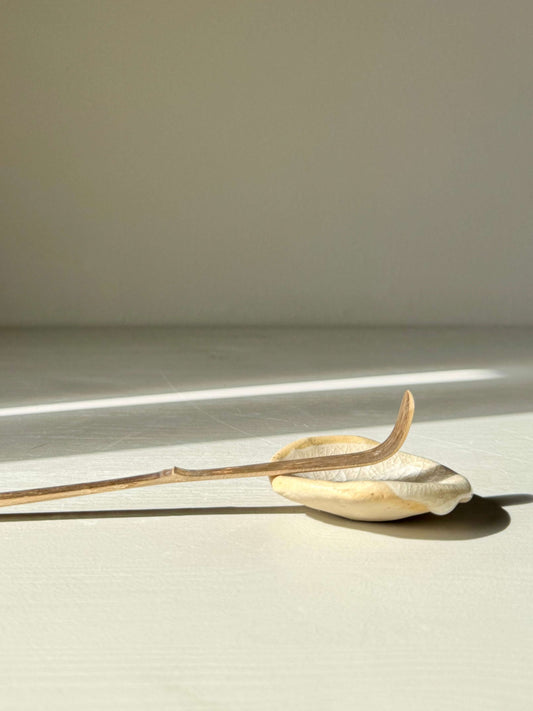 Rounded Chopstick & Matcha Spoon Rest – Kannyū, handmade ceramic with crackle glaze in natural light, showcasing elegant, organic design.