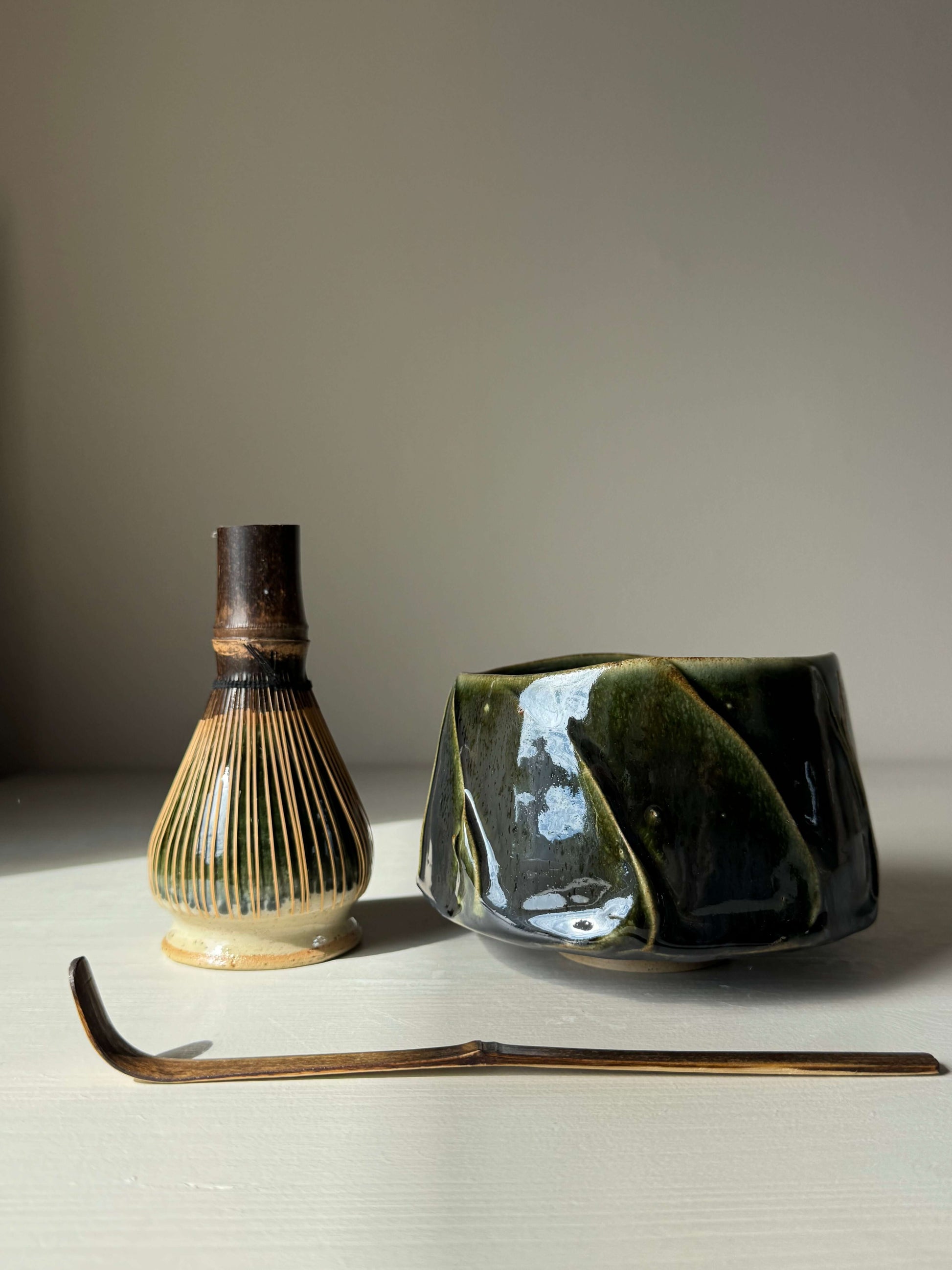 Textured Matcha Bowl - Hinoki Series #11 with handmade ceramic glaze, matched with matcha whisk and bamboo scoop for tea rituals.