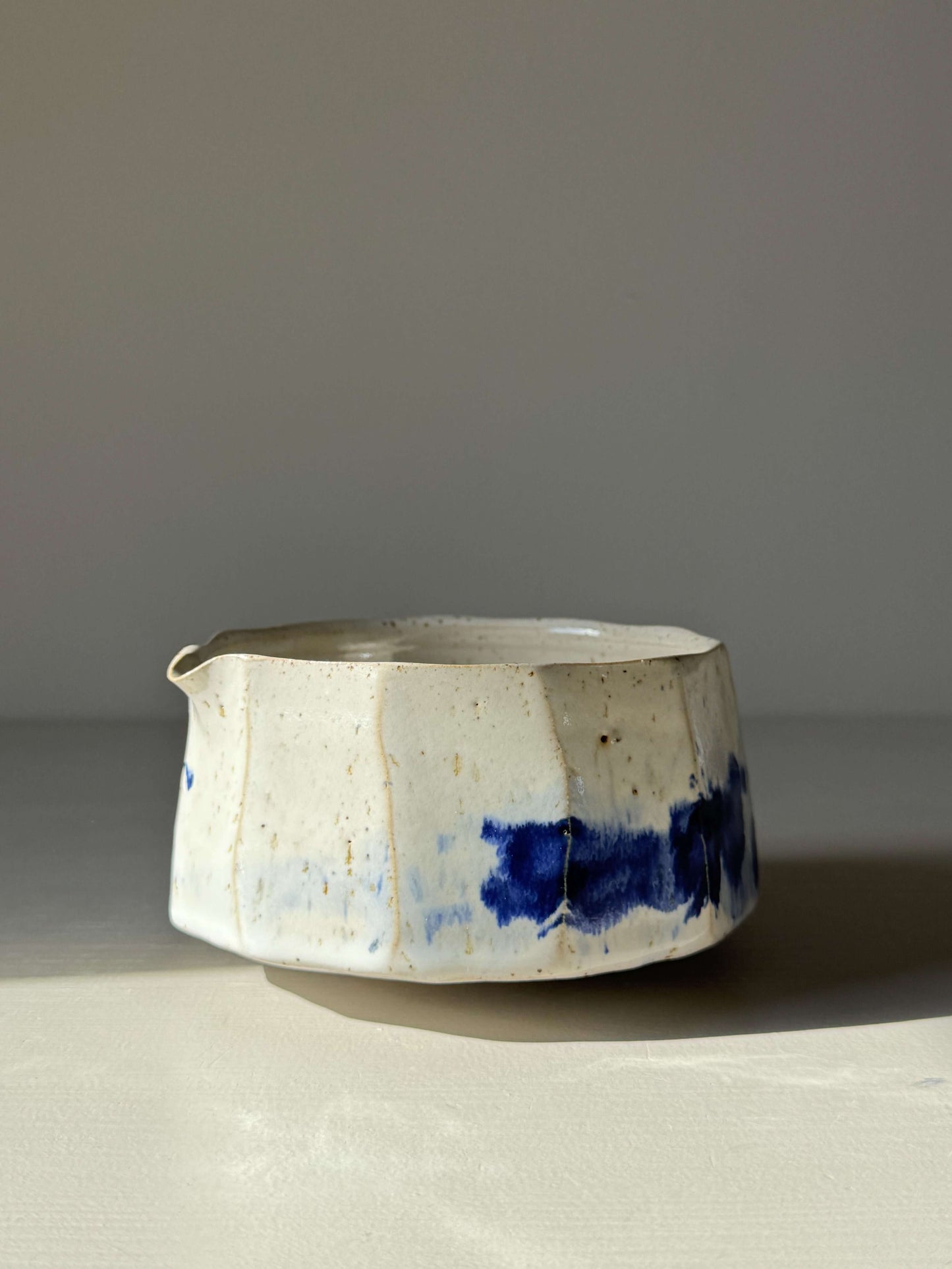 Handmade ceramic Faceted Matcha Bowl with Spout – Cobalt Blue & Glossy White Glaze #010 featuring a unique faceted design.