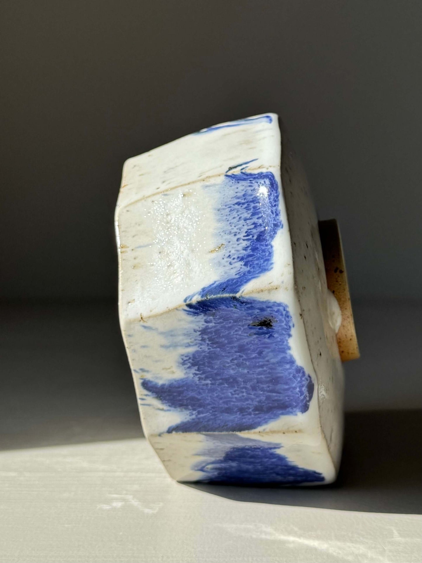 Handmade ceramic Faceted Matcha Bowl with Spout – Cobalt Blue & Glossy White Glaze #01, showcasing faceted design with cobalt accents.