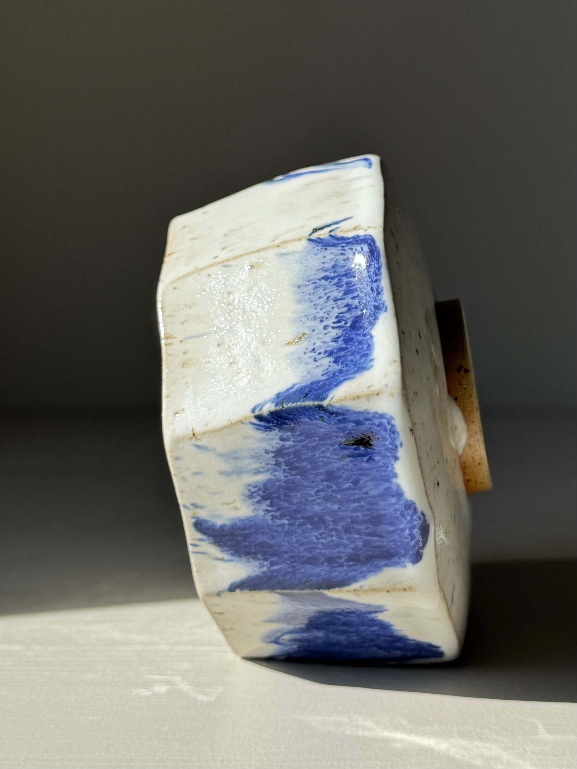 Handmade ceramic Faceted Matcha Bowl with Spout – Cobalt Blue & Glossy White Glaze #01, showcasing faceted design with cobalt accents.