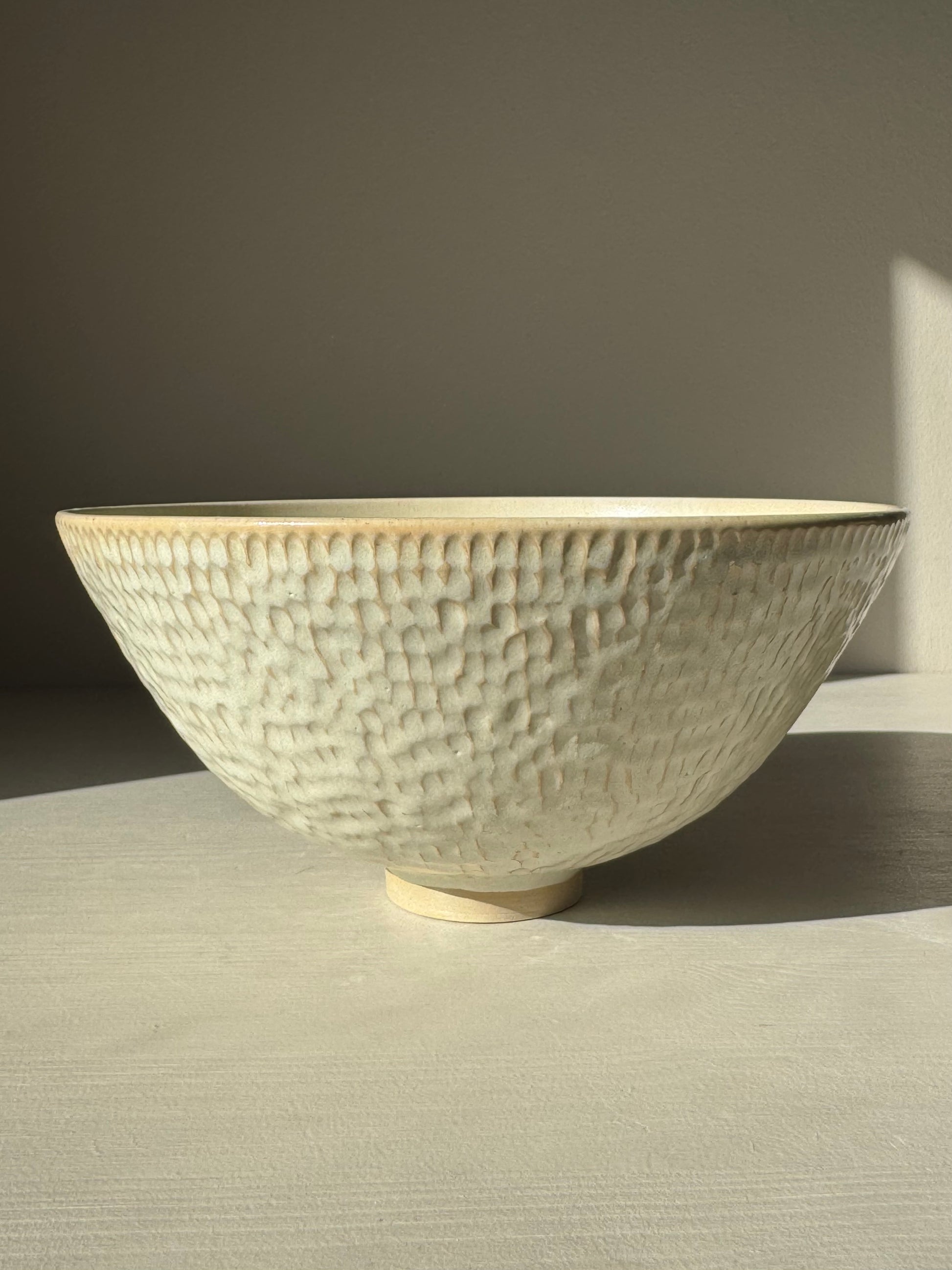 Medium Bowl – Moonstone with creamy satin finish and hand-carved texture, highlighting its warmth and elegant design.