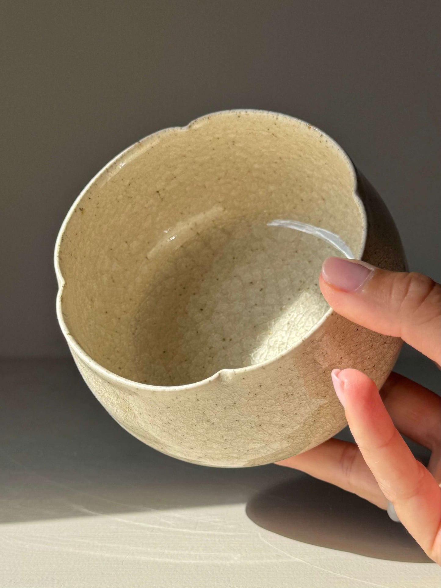 Matcha Bowl - Kannyū #01, handmade ceramic with a crackle glaze, showcasing a rounded design reflecting calm and balance.