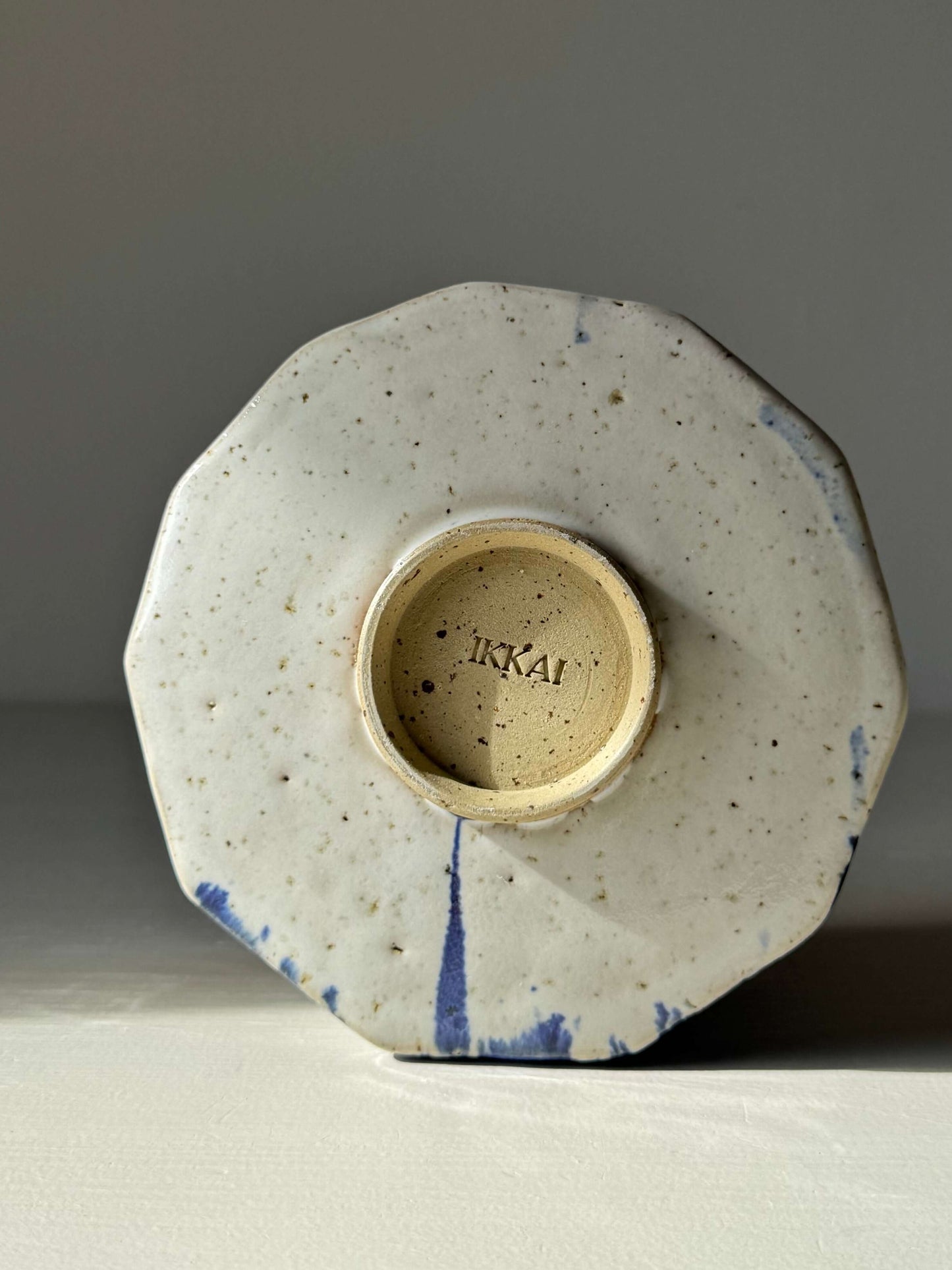 Bottom view of Faceted Matcha Bowl with Spout – Cobalt Blue & Glossy White Glaze #010, showcasing handmade ceramic details.