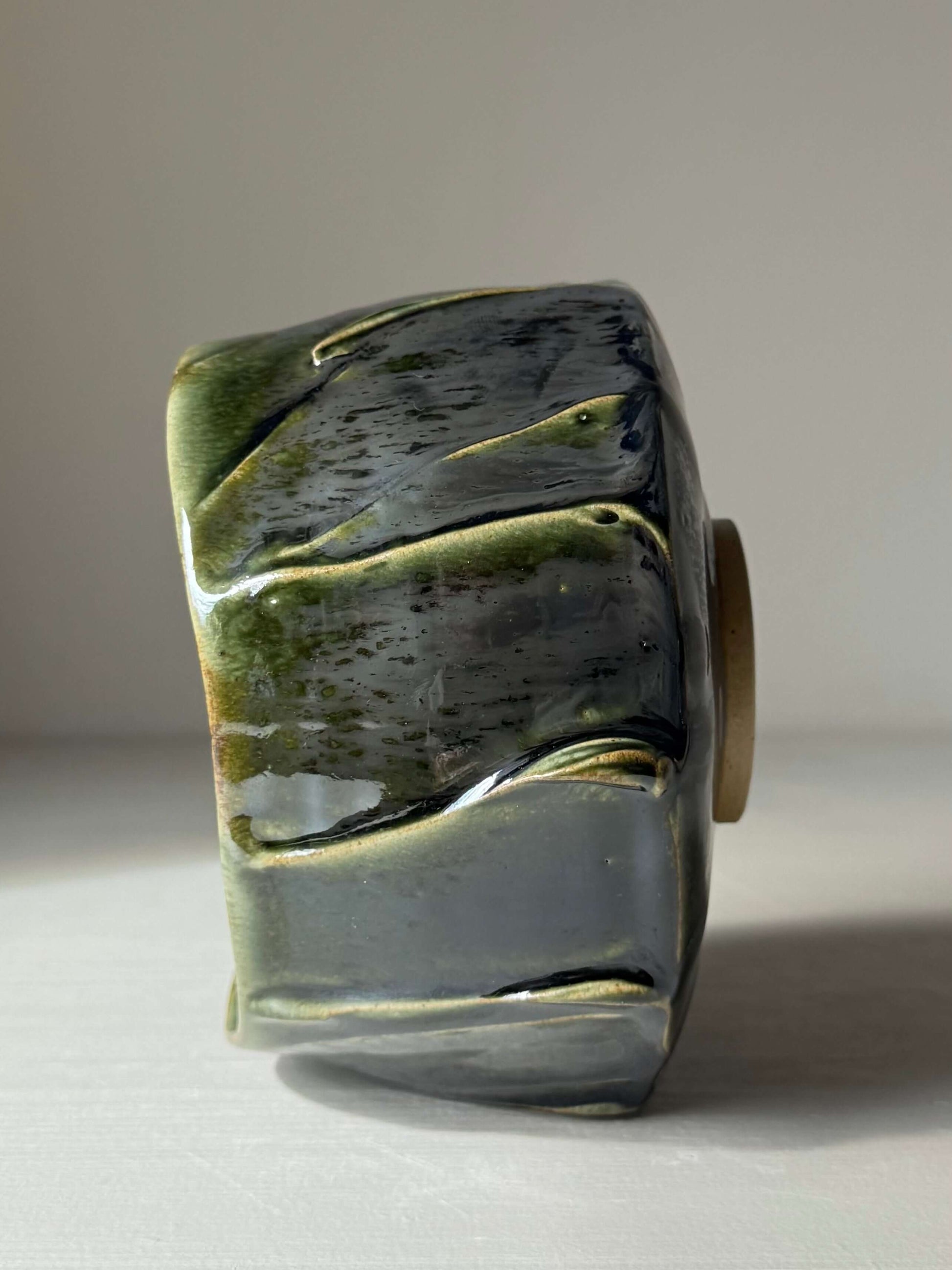 Handmade Textured Matcha Bowl - Hinoki Series #09, ceramic with green glaze inspired by Hinoki tree, side view.