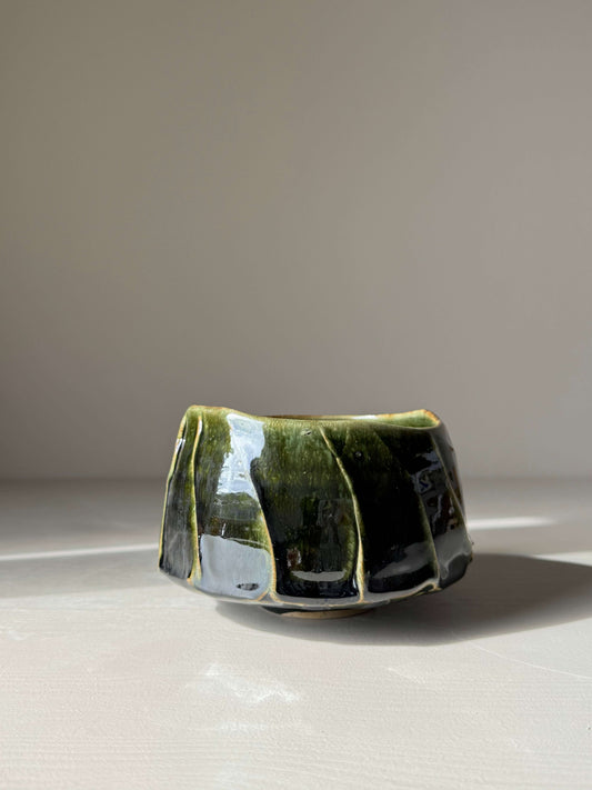 Handmade ceramic Textured Matcha Bowl - Hinoki Series #06 with green glaze and textured finish on a light surface.