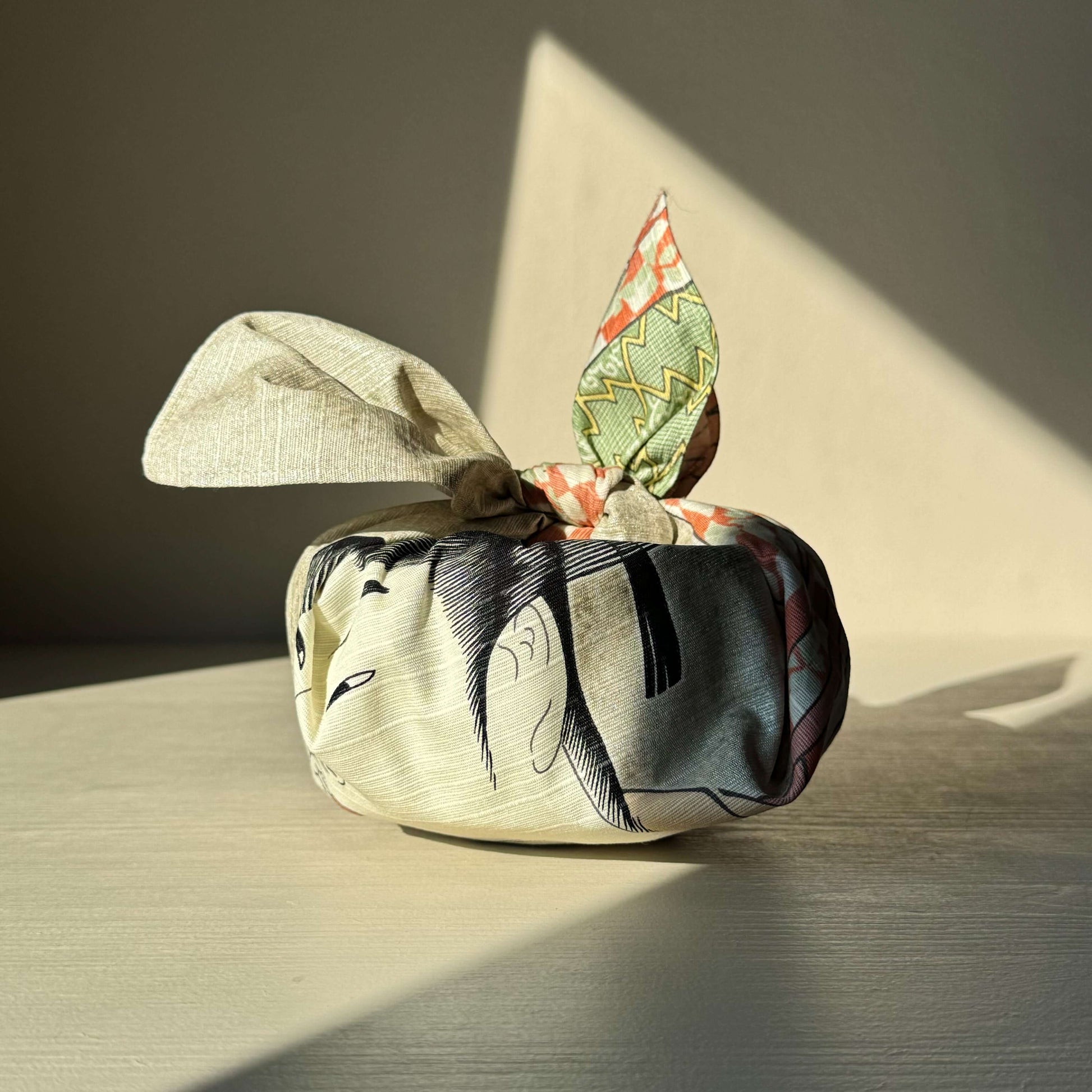 Small Furoshiki - "A Woman Playing A Poppin" Gray with handmade ceramic design, featuring Utamaro's artwork in red checkered kimono.