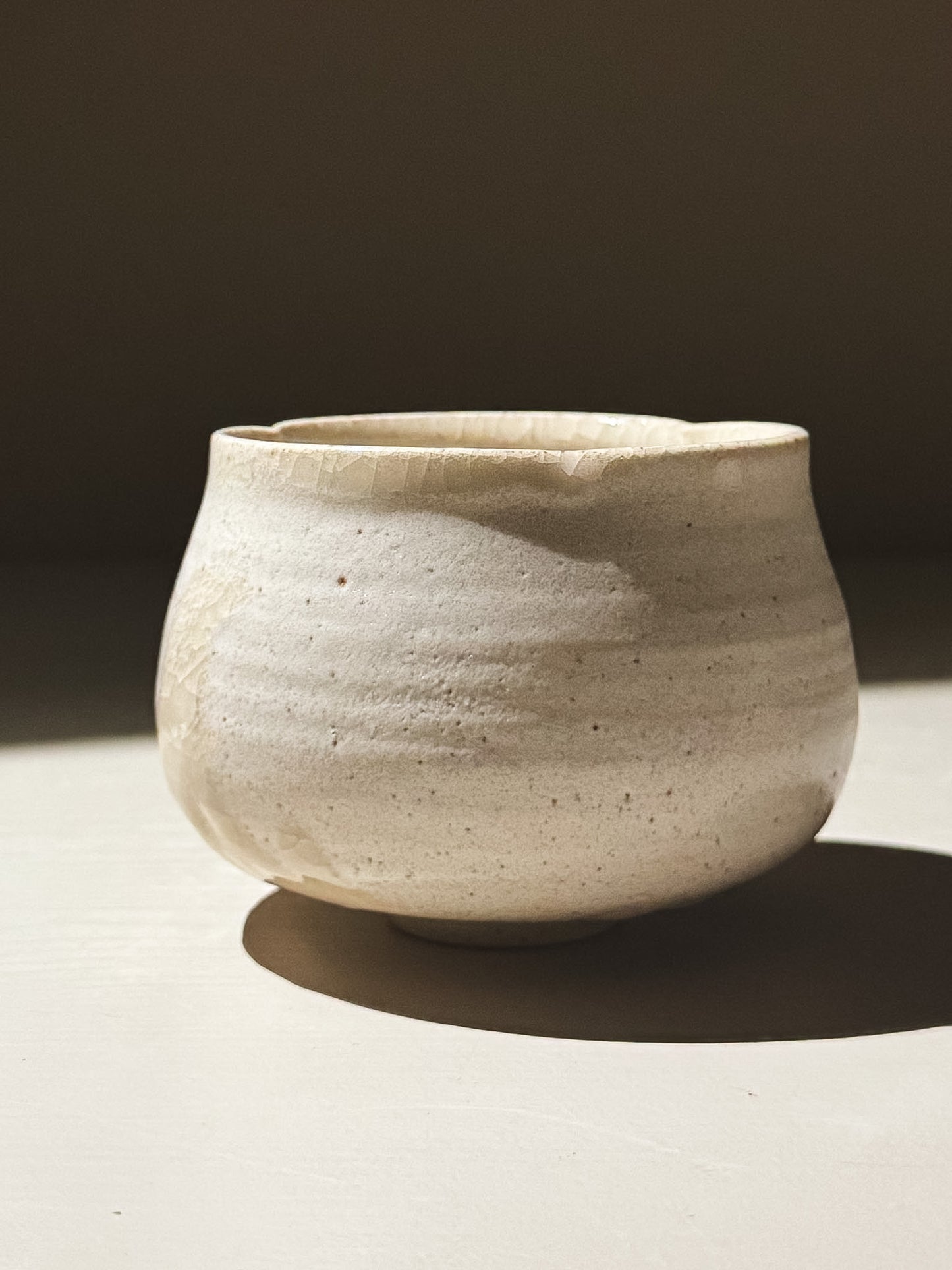 Yunomi Cup - Kannyū Series #11 showcasing a delicate wheel-thrown design with a crackle glaze finish.