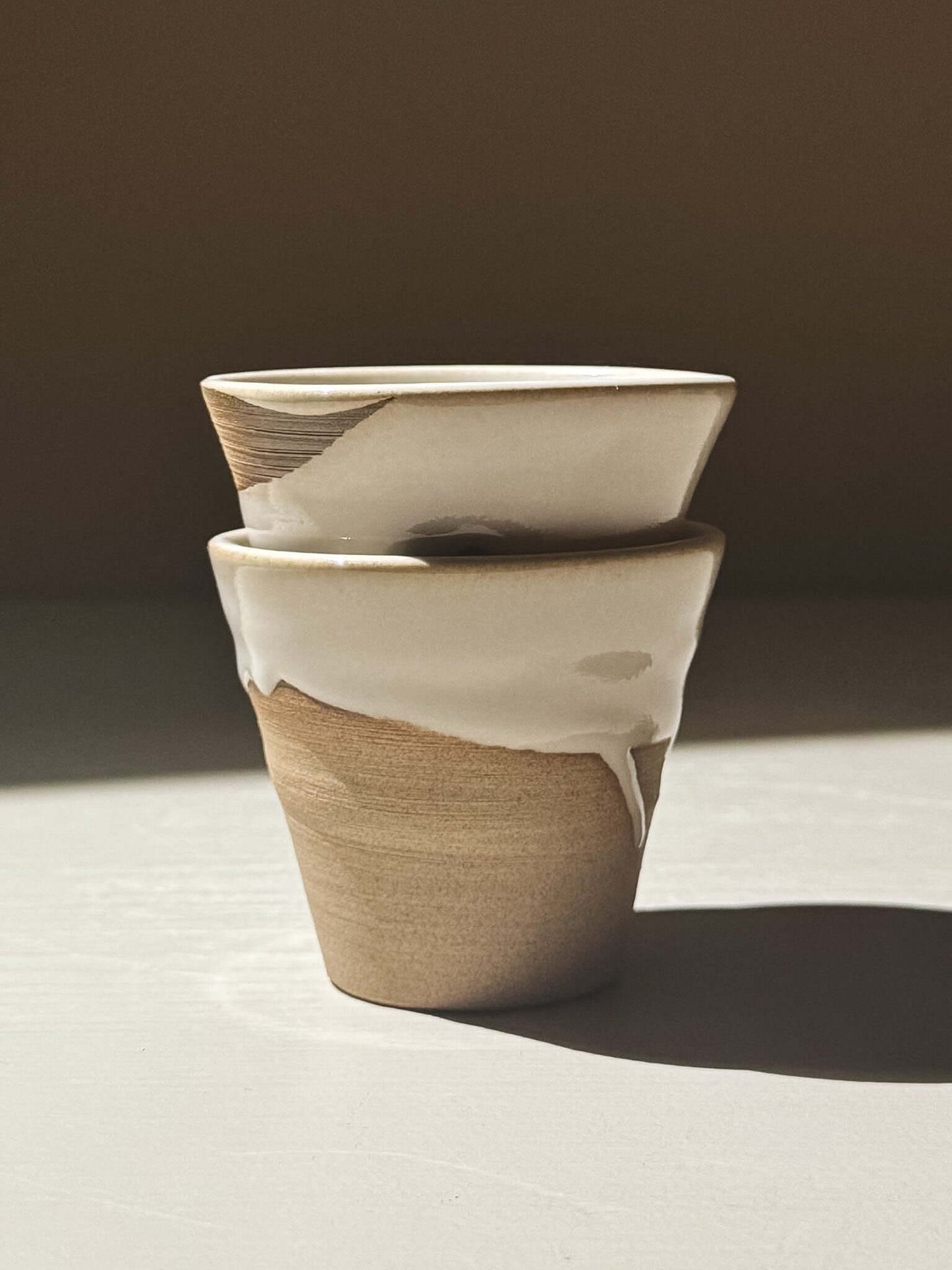 Espresso Cup - Yuki #01, set of two wheel-thrown cups with glossy white glaze on toffee-toned clay.