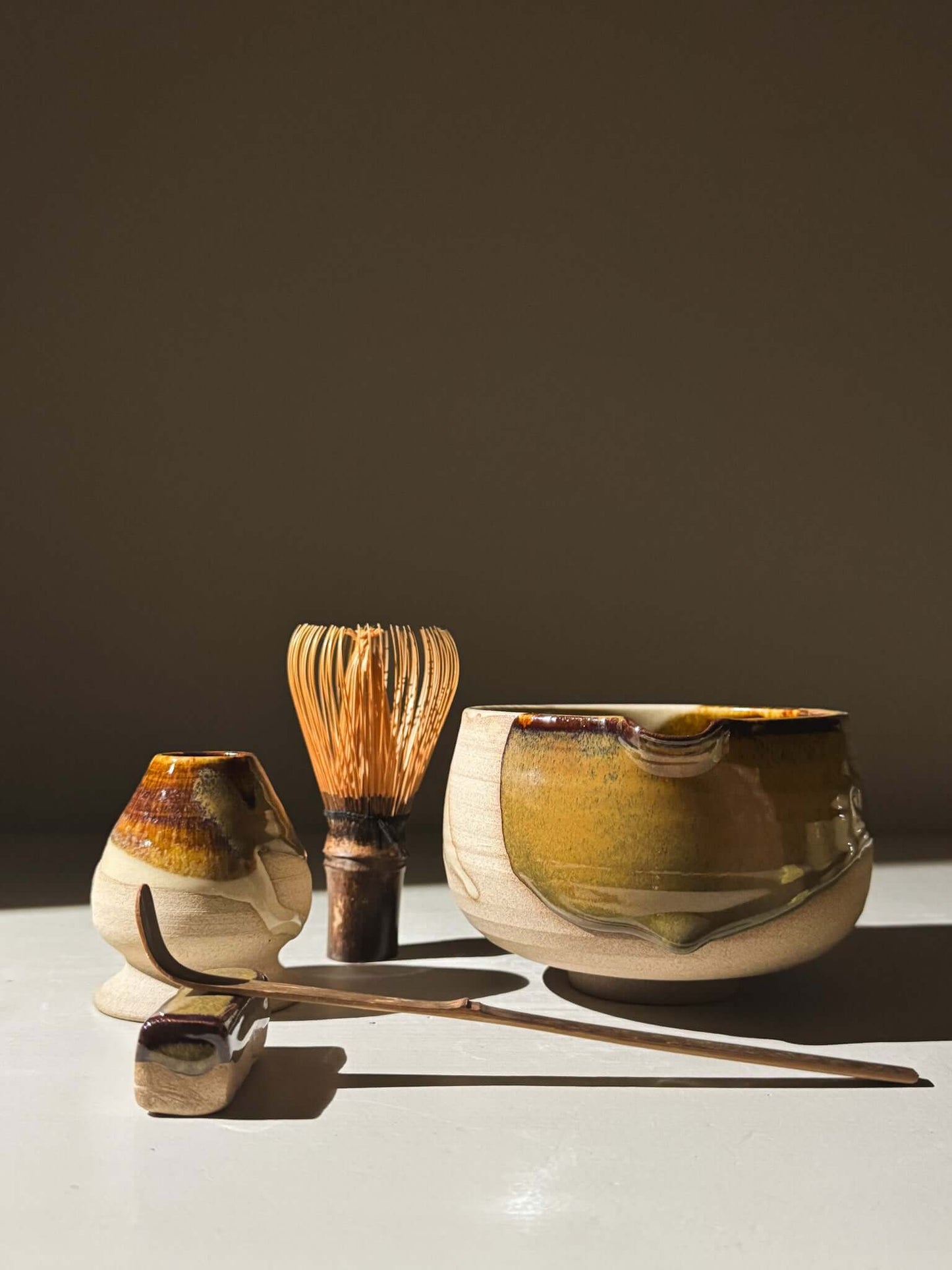 Matcha Bowl with Spout – Inyo #01 with tenmoku glaze and bamboo whisk