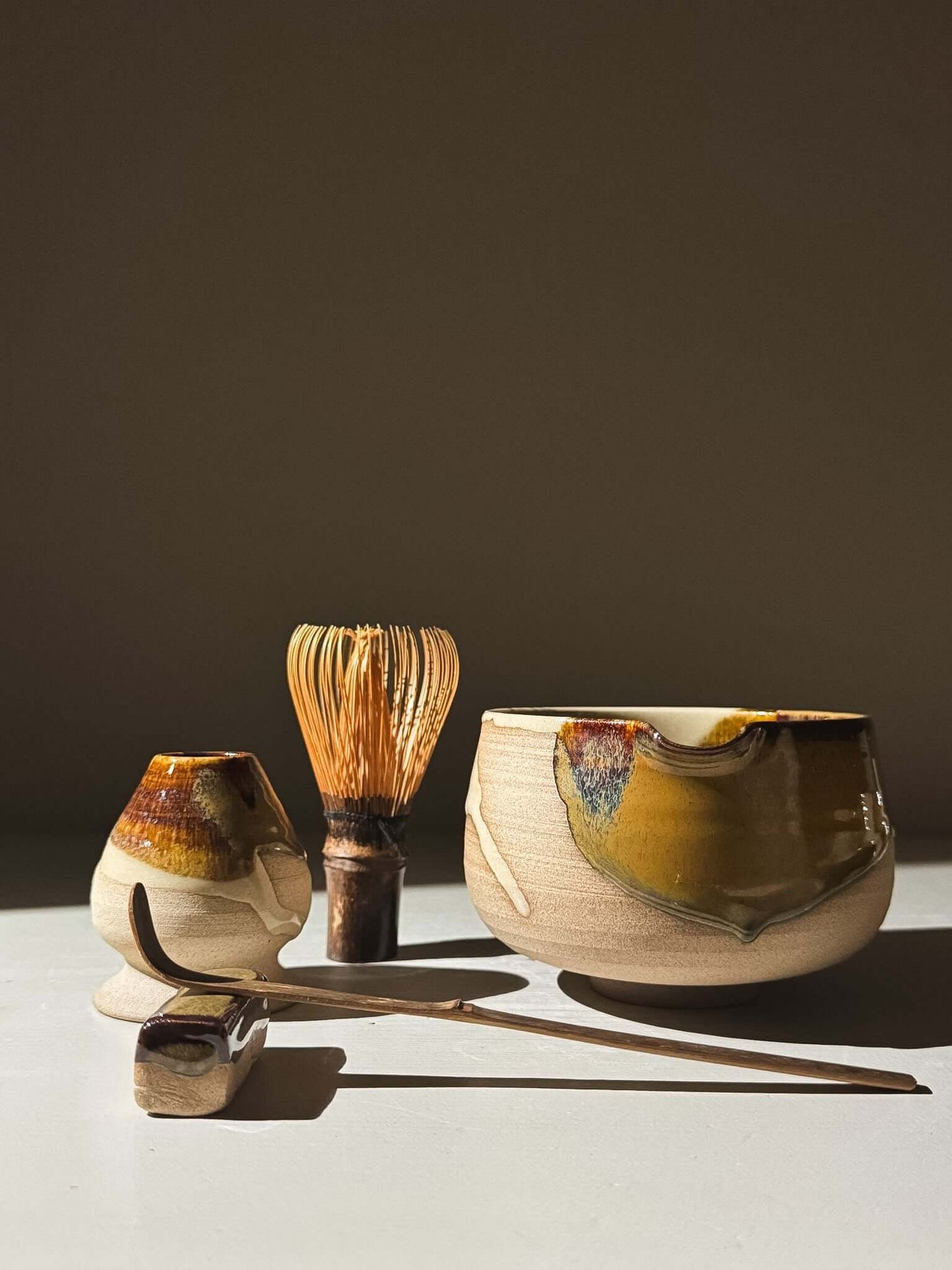 Matcha Bowl with Spout – Inyo #05, part of the Inyo Series, showcasing unique handmade glazes on warm stoneware clay.