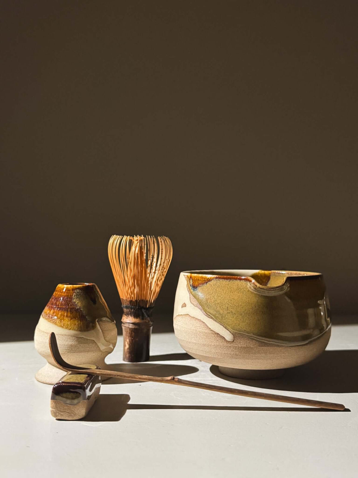 Matcha Whisk Holder - Inyo Series with handmade ceramic bowl and whisk on display