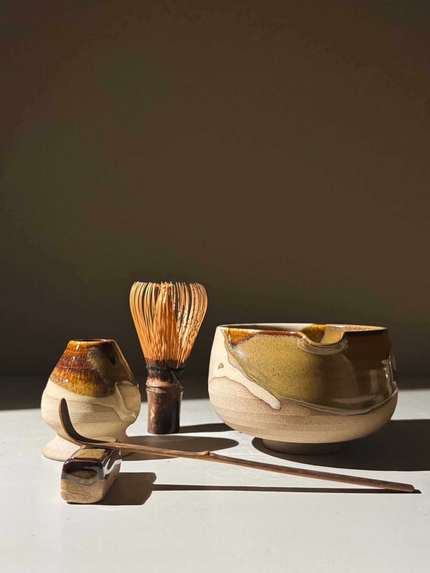 Handmade Matcha Bowl with Spout – Inyo #08 and tea ceremony tools on display