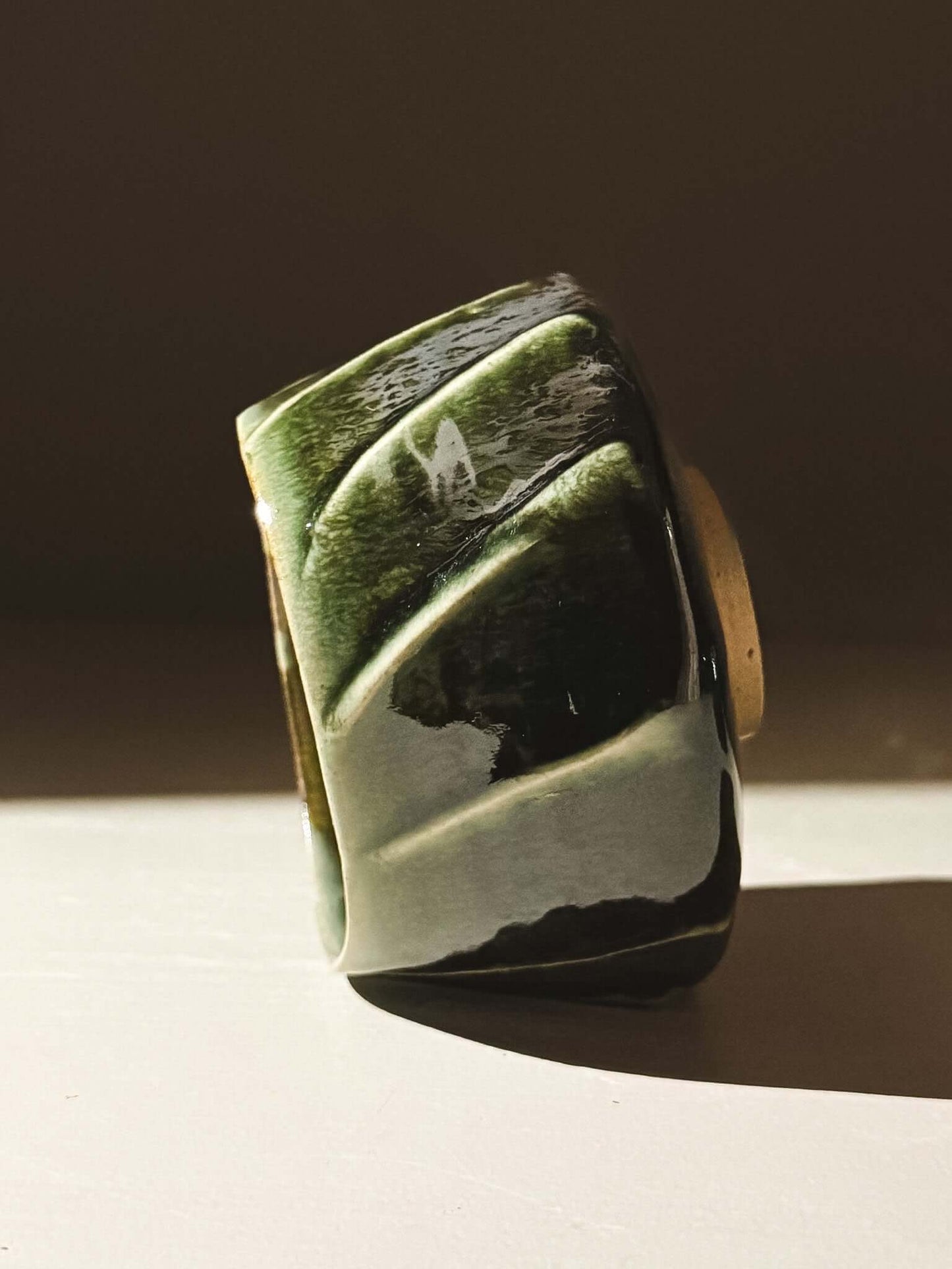 Yunomi Cup - Hinoki #01 with deep green glaze and flowing slip texture, handmade for unique everyday tea moments.