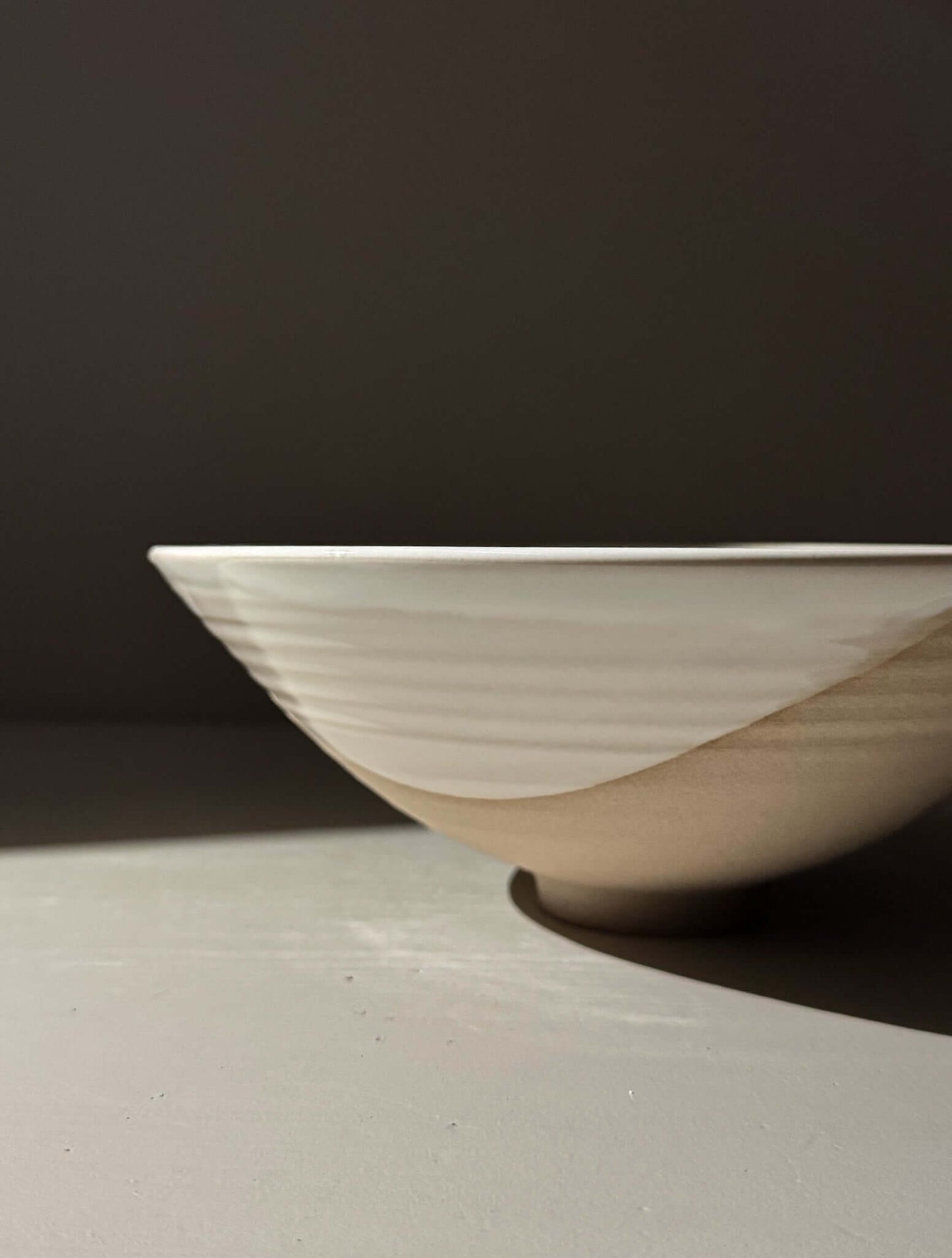 Medium Bowl - Yuki #01 with glossy white glaze and subtle rings on a balanced round base, perfect for any table setting.