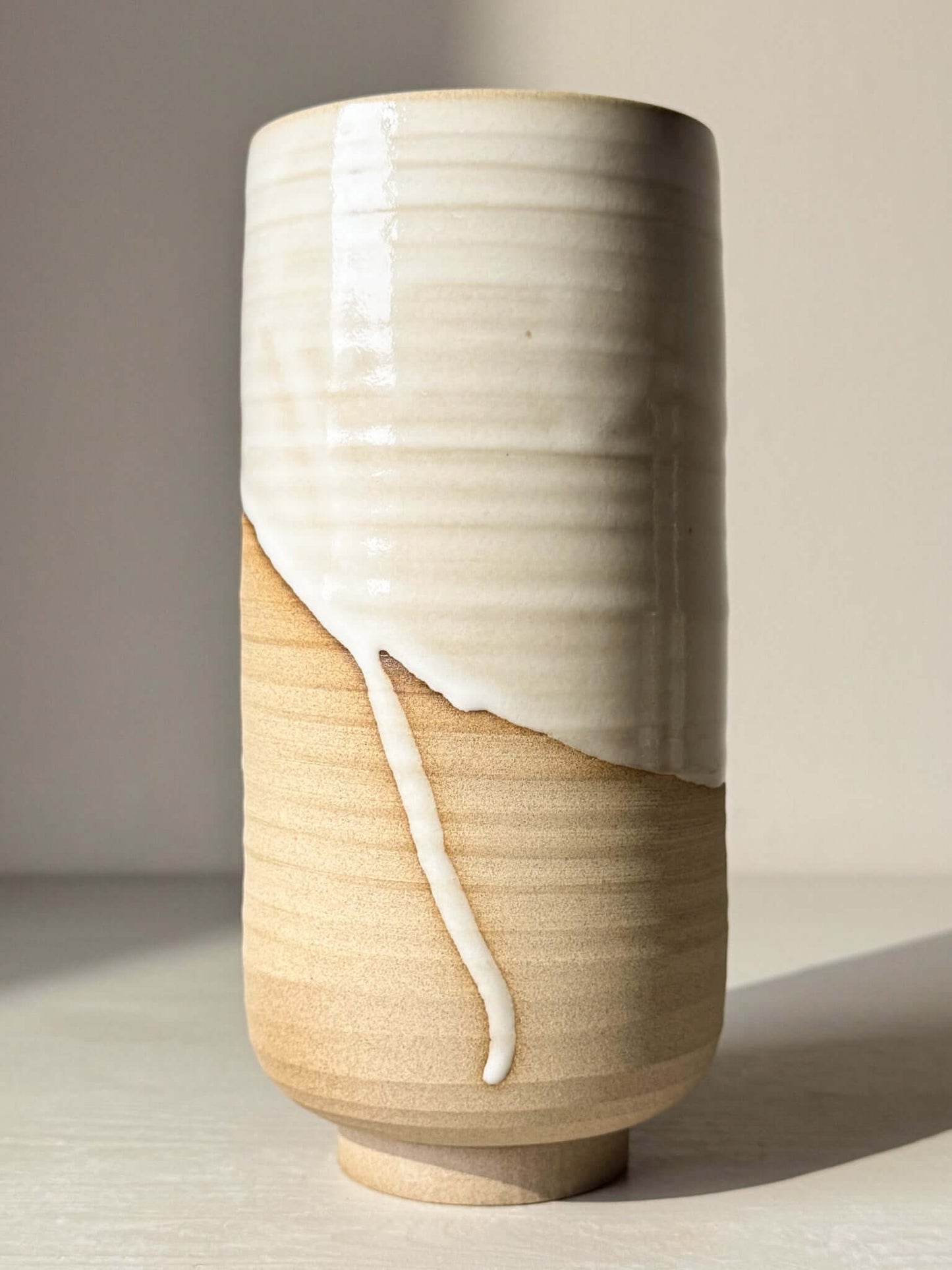 Large Vase – Yuki with glossy white glaze and raw lower half, perfect for adding natural warmth and elegance to any space.
