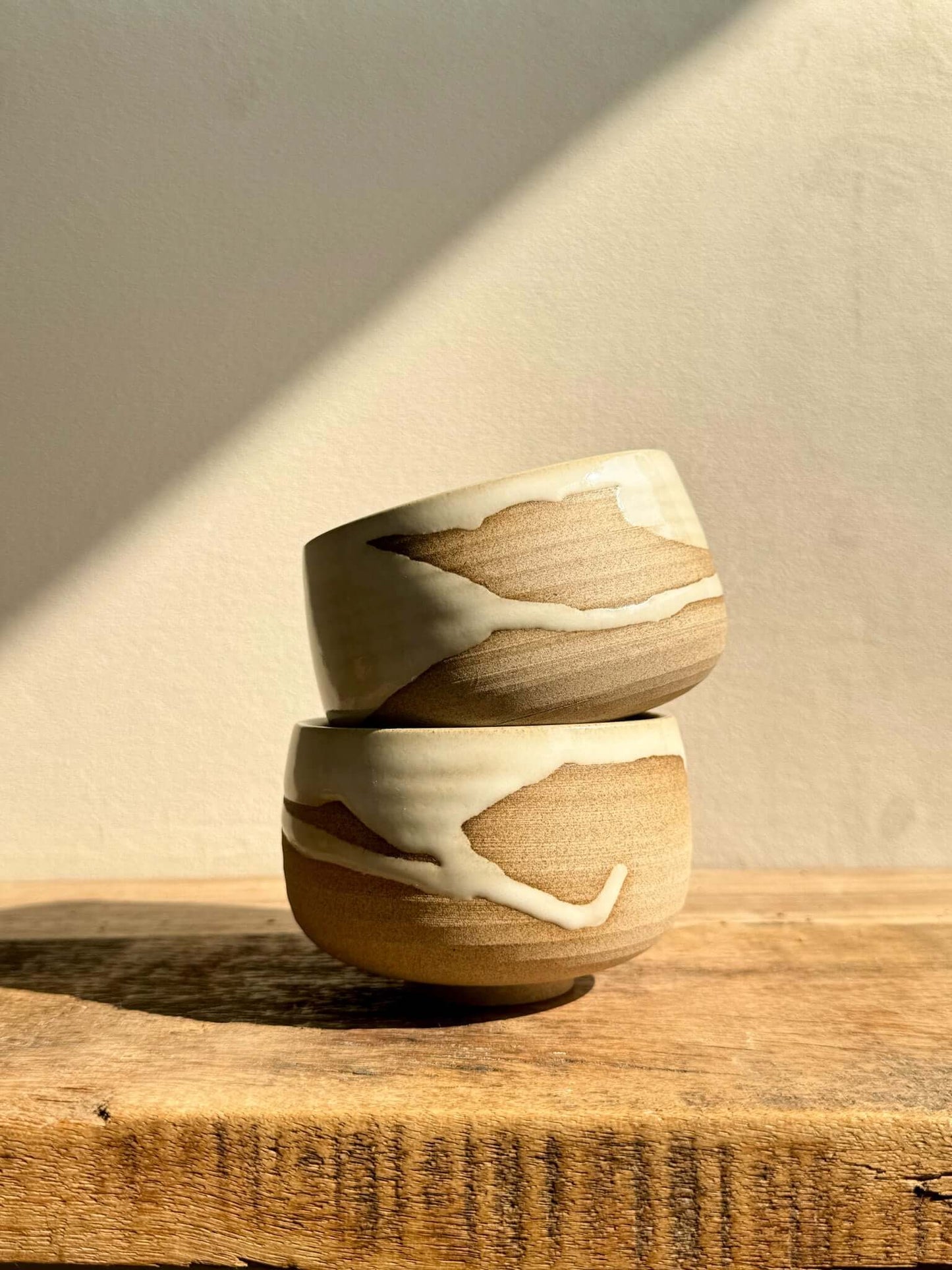 Coffee cups - Yuki Series handmade ceramic with unique white glaze on toffee clay, showcasing natural drips and design variations.