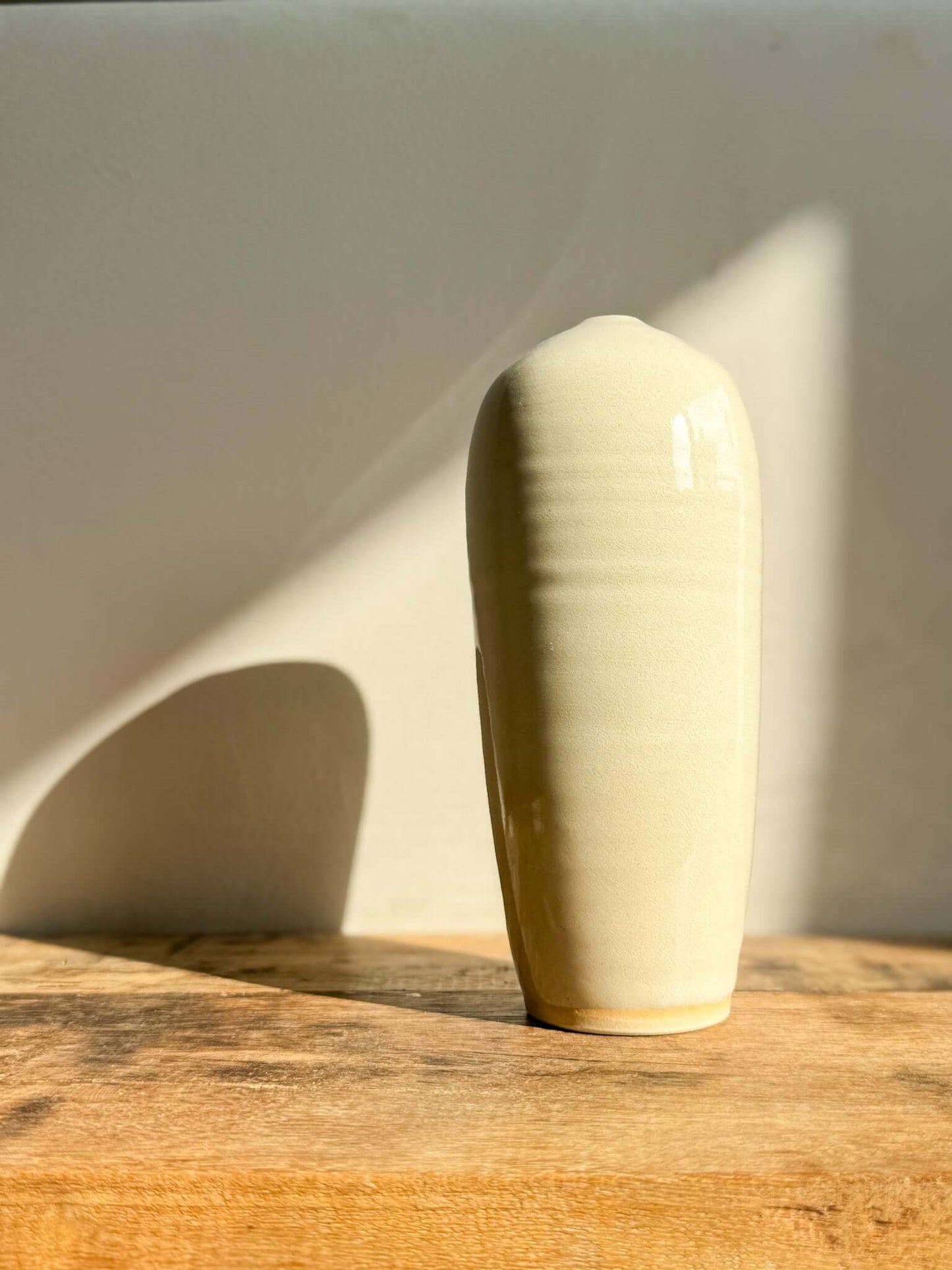 Handmade Ceramic Vase - Gosu Series #07 showcasing glossy clear glaze and unique cobalt blue accents
