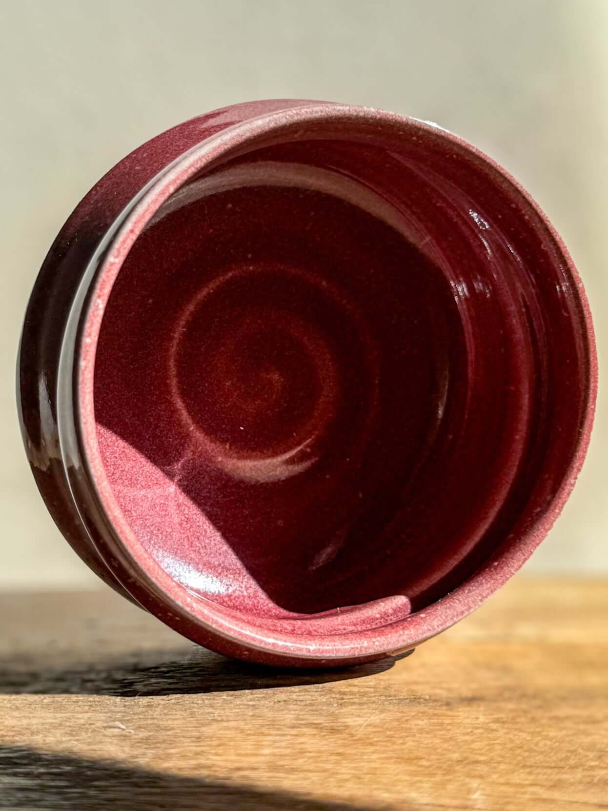 Ume Series #05 Matcha Bowl in red with rounded shape and flowing ridges, inspired by Japanese Ume blossom, symbolizes resilience.