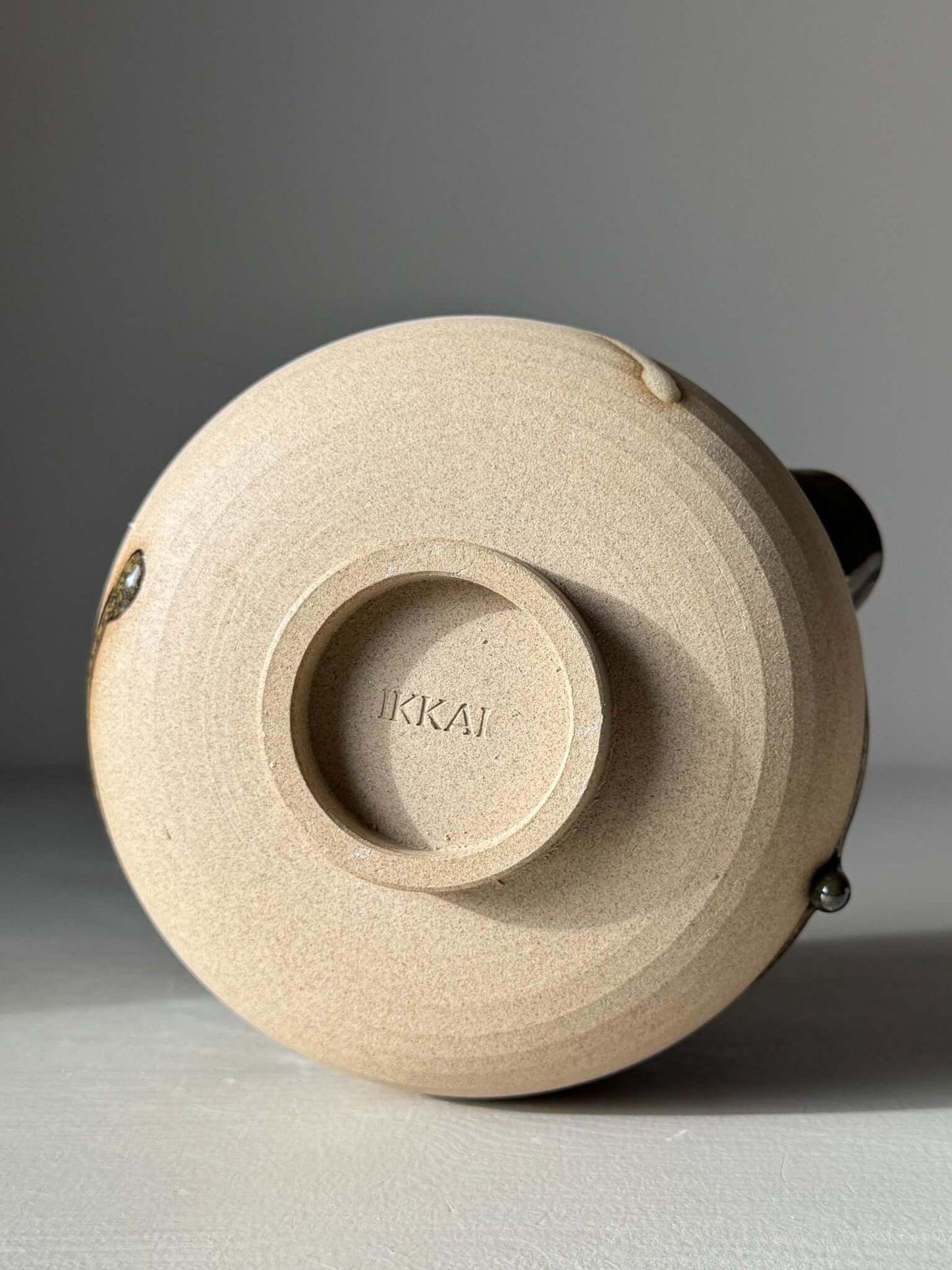 Matcha Bowl with Spout – Inyo #06 showing the unique underside and handmade texture of the stoneware.