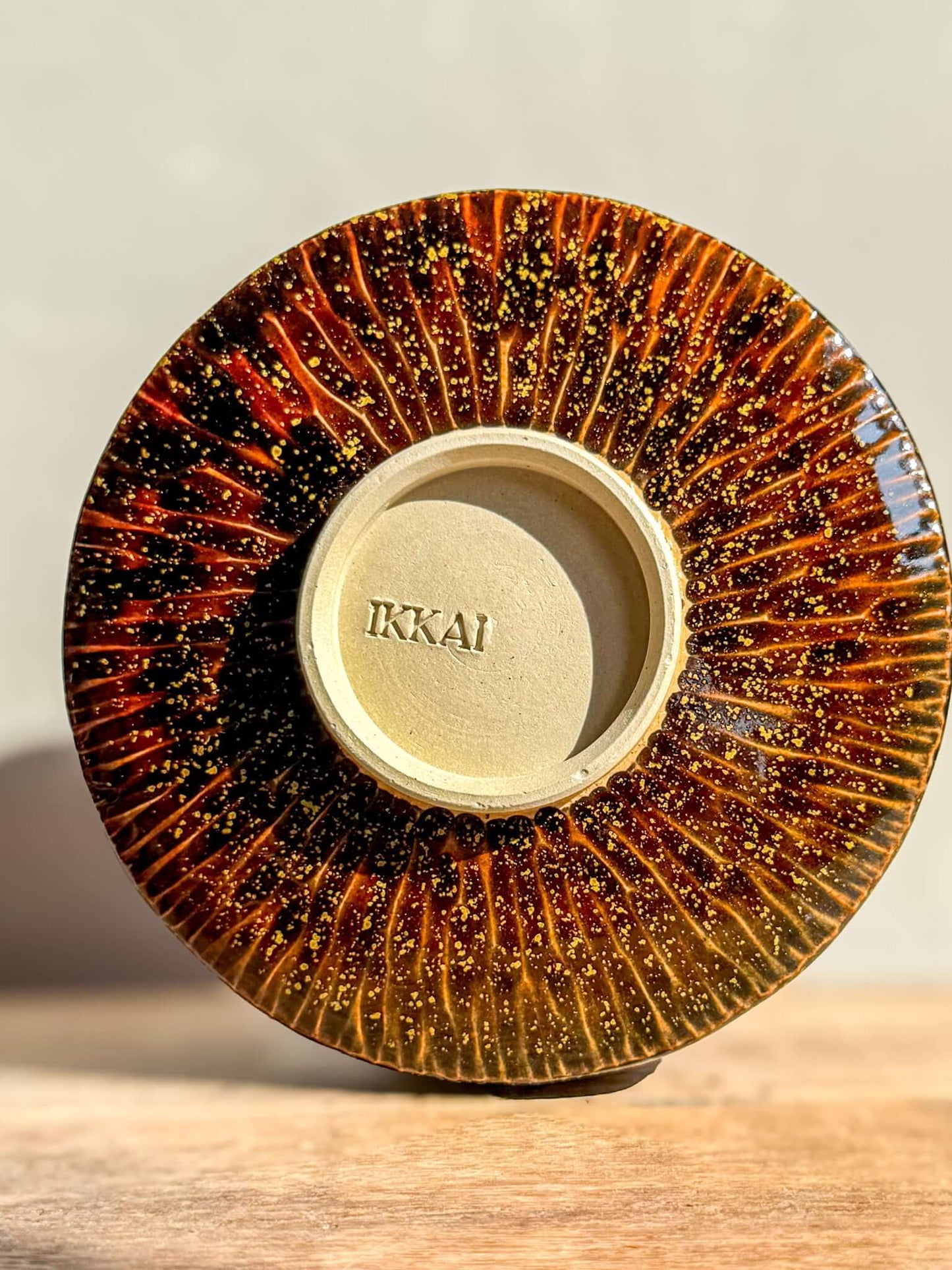 Kinsei Matcha Bowl #03 displaying its golden star pattern and rich brown glaze.