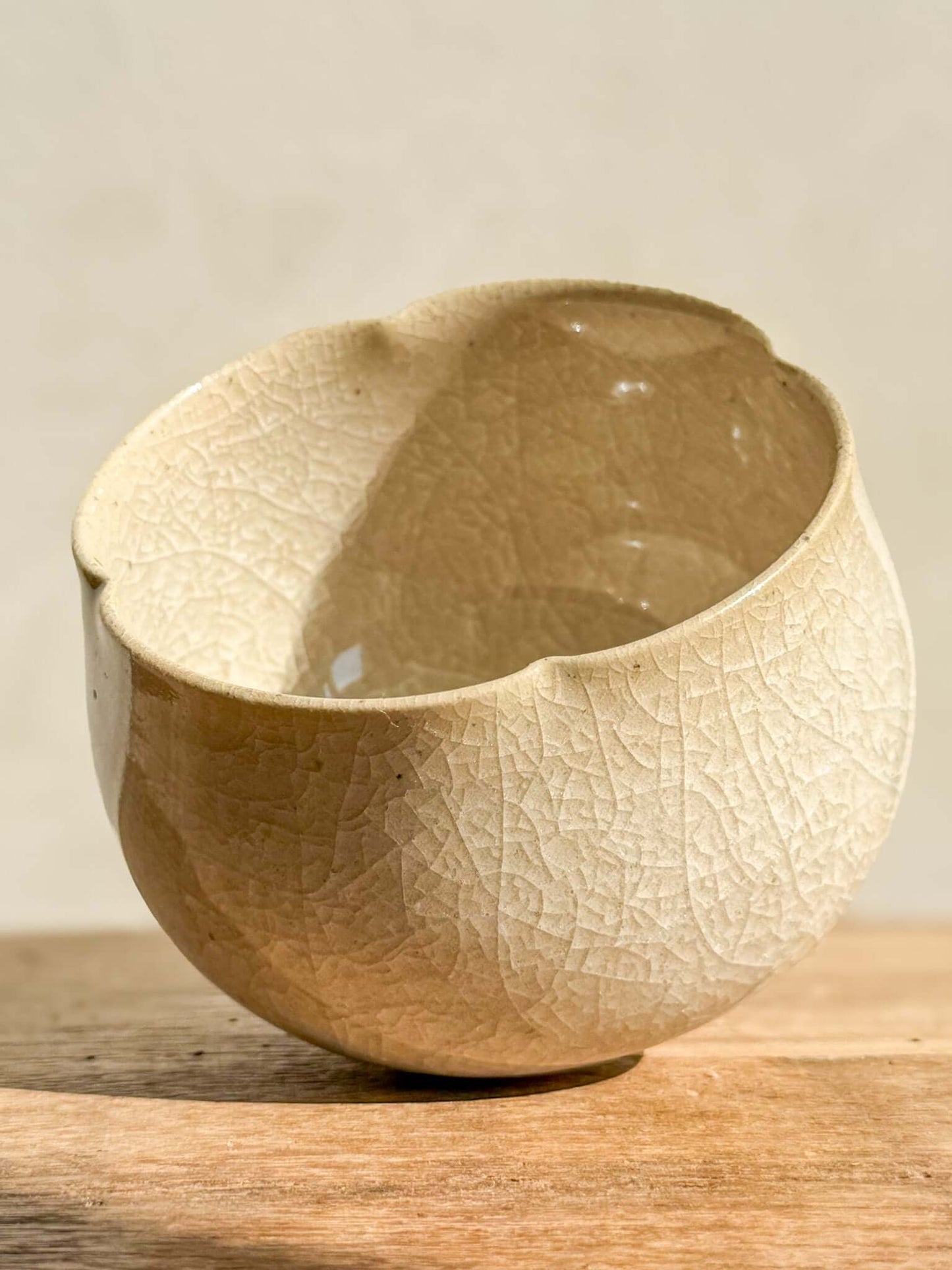 Yunomi Cup from Kannyū Series #01, featuring a transparent crackle glaze with fine lines, showcasing elegant craftsmanship.
