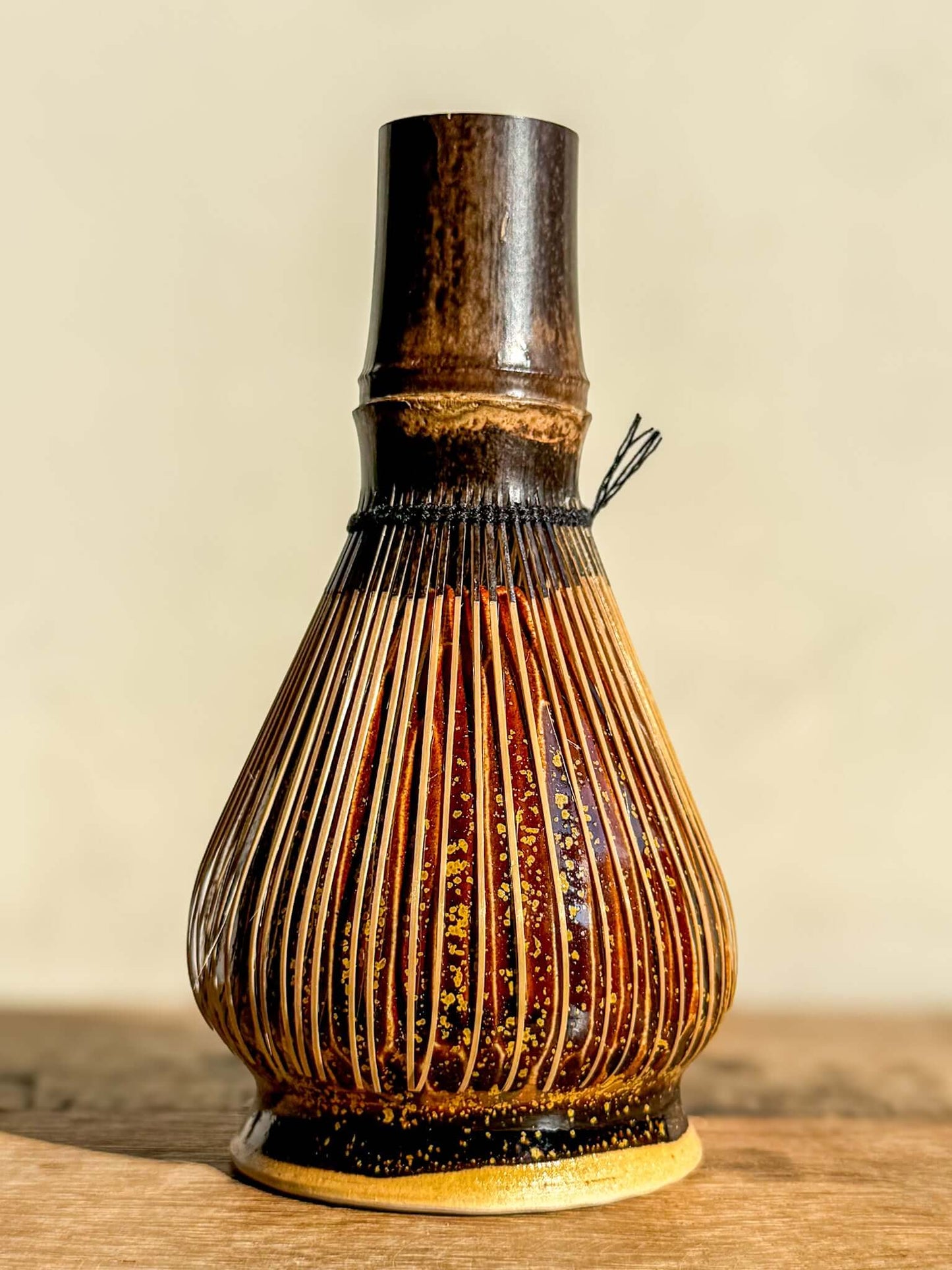 Kinsei Carved Matcha Whisk Holder with amber glaze for bamboo whisk, enhancing your tea setup and preserving whisk shape.
