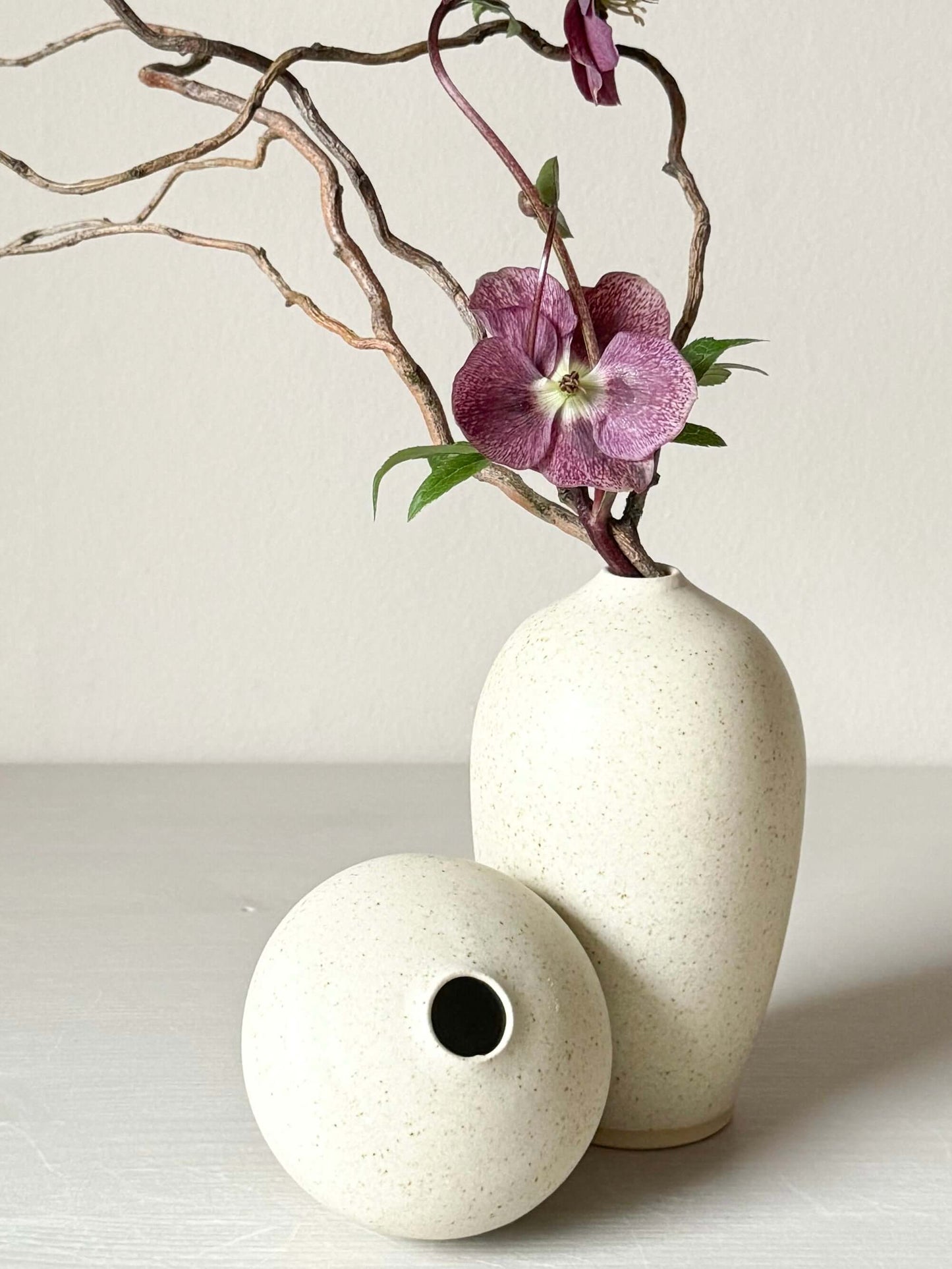 Speckled Matte Cream Ceramic Vase with Purple Flower, 13 cm Tall