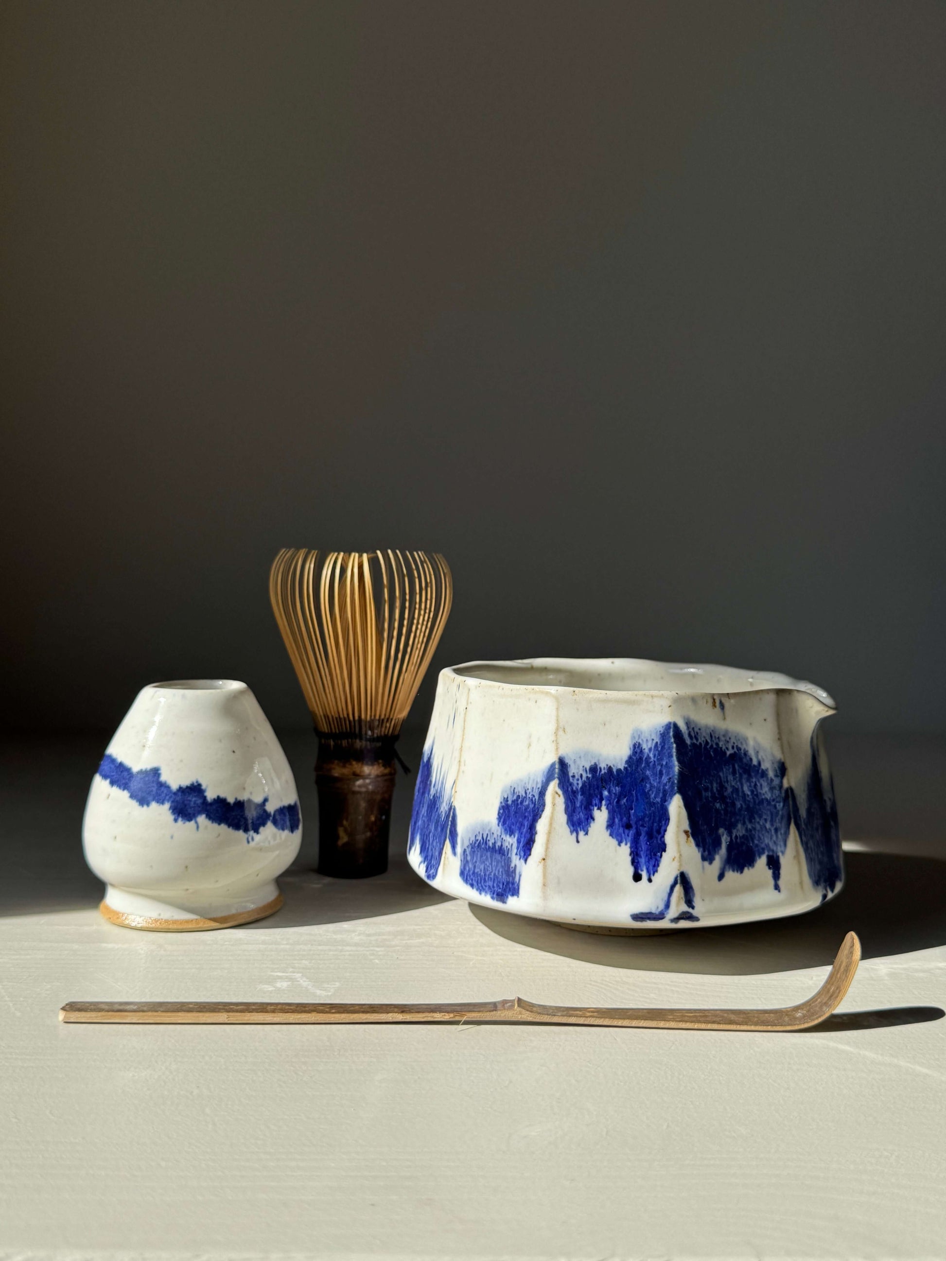 Faceted Matcha Bowl with Spout – Cobalt Blue & Glossy White Glaze #08, handmade ceramic with whisk and scoop.