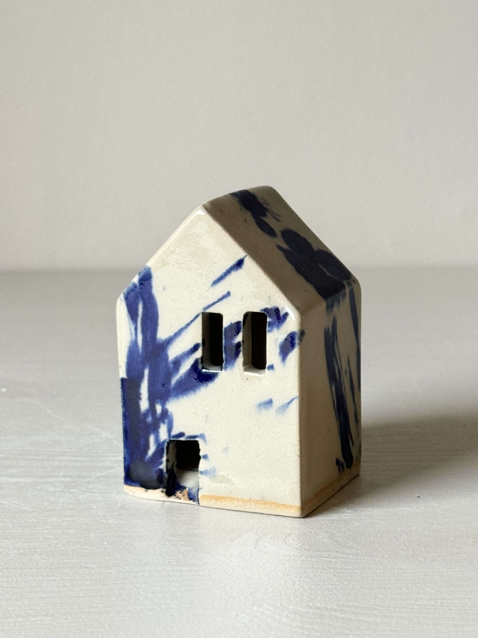 Handbuilt Ceramic Houses – Gosu Series, handmade ceramic house with cobalt blue splashes, Dutch style, 8.5cm by 5.5cm by 4.5cm.