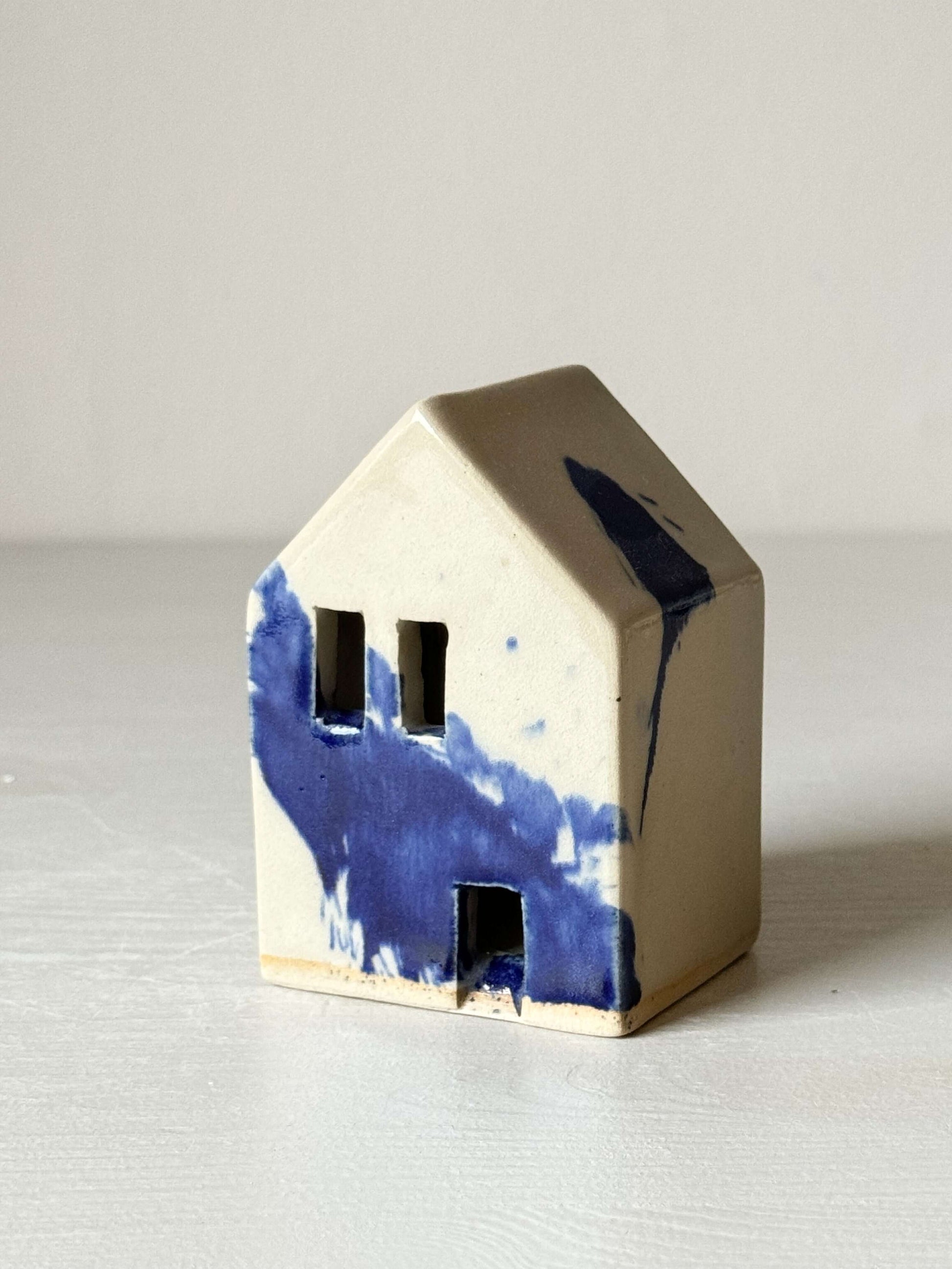 Handbuilt Ceramic Houses – Gosu Series with cobalt blue splashes, handmade ceramic house decor for adding personality to rooms.