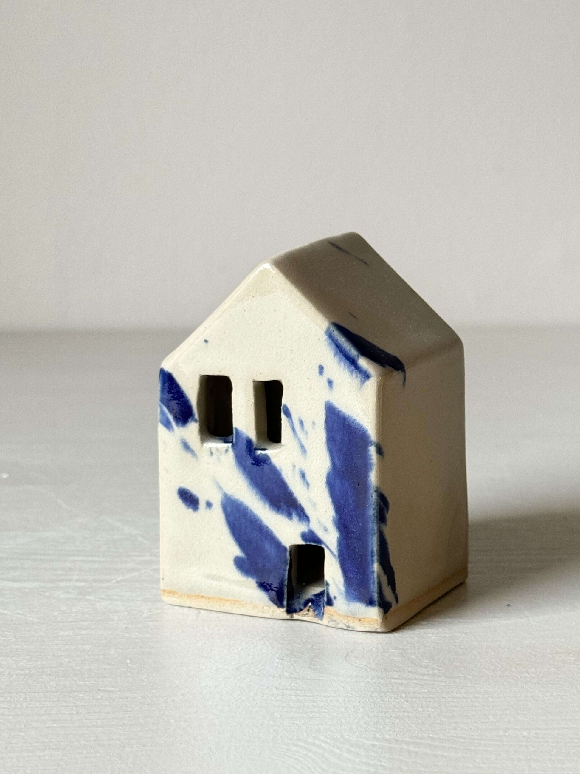Handbuilt Ceramic Houses – Gosu Series with cobalt blue splashes, handmade ceramic decor piece adding a cheerful vibe to any room.