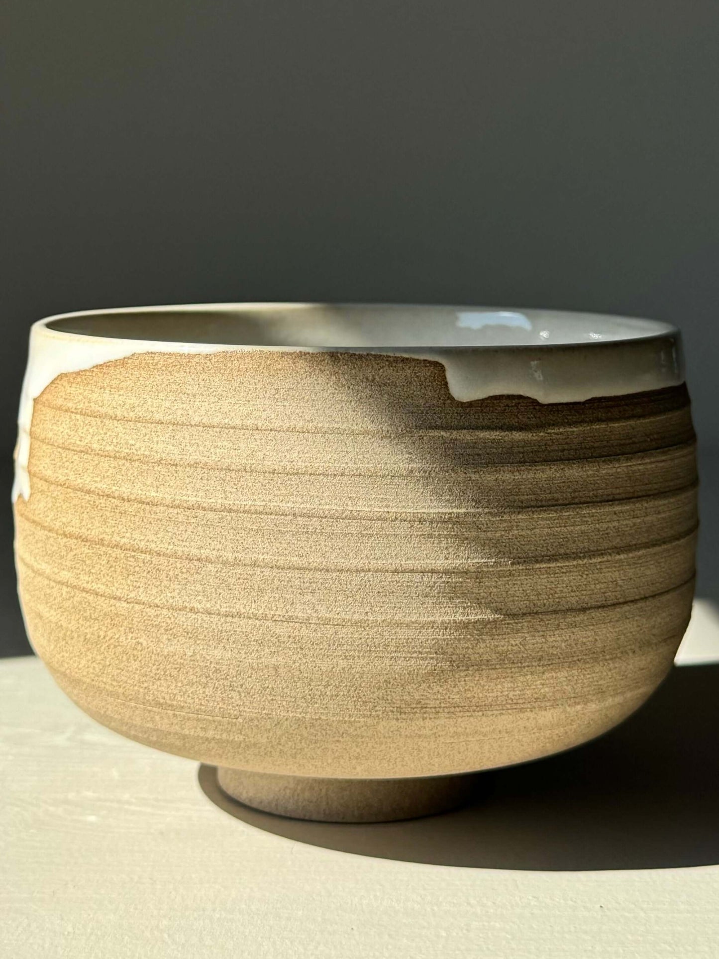 Alt Tag: Handmade Matcha bowl from Yuki Series #06, featuring toffee clay and glossy white glaze, perfect for a calming daily ritual.