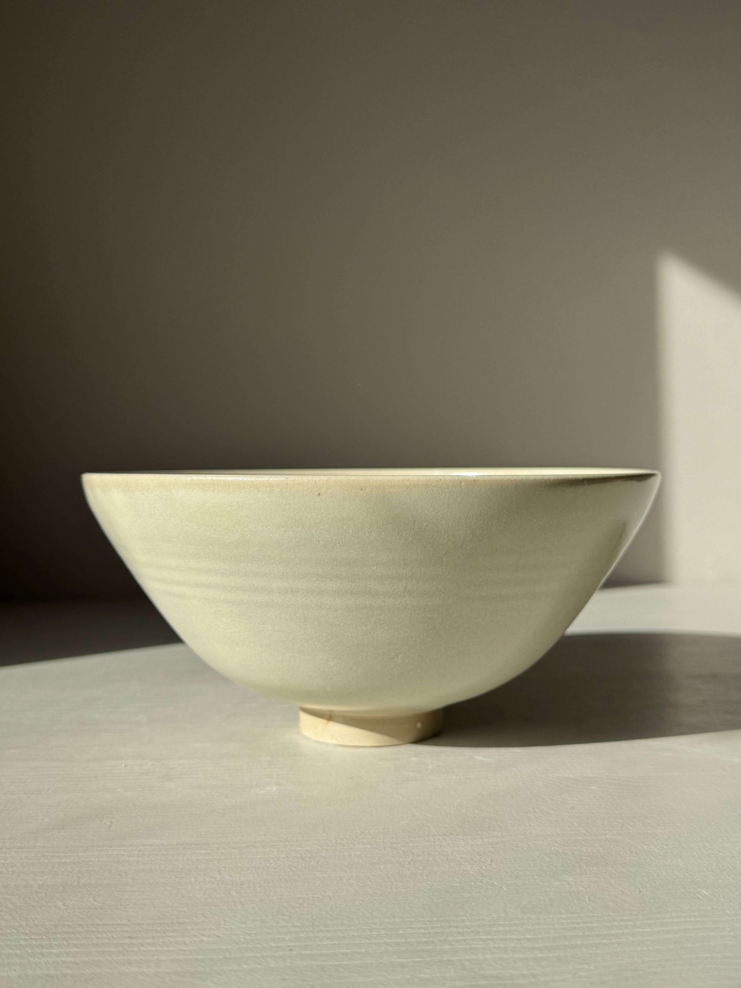 Bowl - Moonstone #02 handcrafted ceramic with moonstone glaze, features a rounded form and raised foot, calming and timeless design.