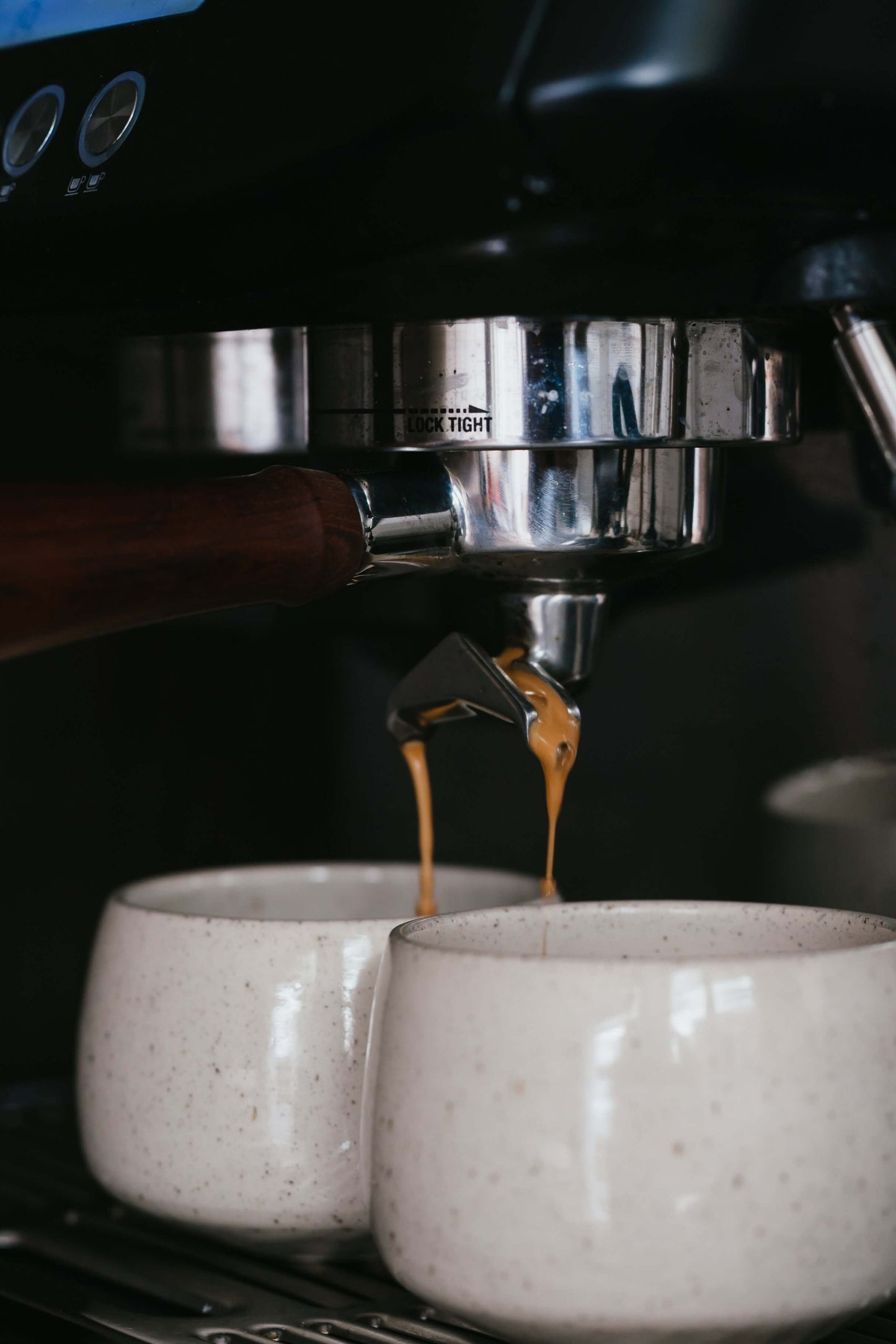 Cups - Speckled Clear Glaze capturing espresso under a coffee machine, highlighting handmade ceramic craftsmanship.