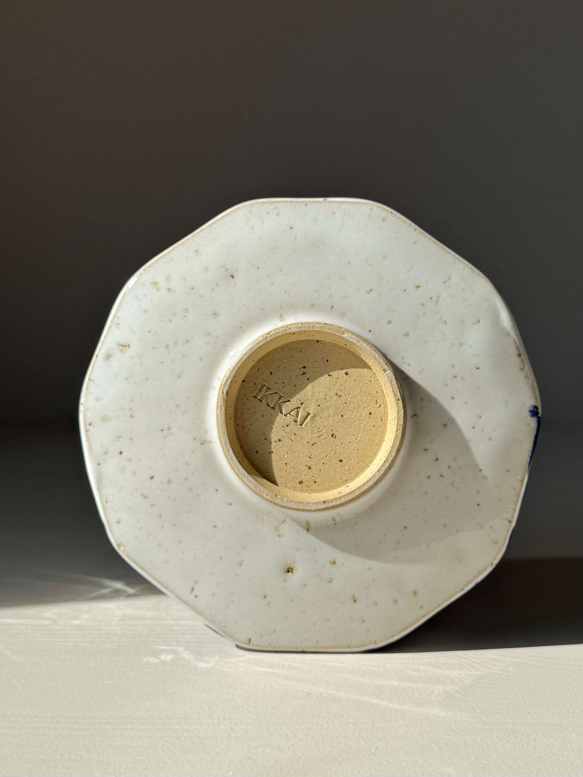 Bottom view of Faceted Matcha Bowl with Spout – Cobalt Blue & Glossy White Glaze #07, showing handmade ceramic details.